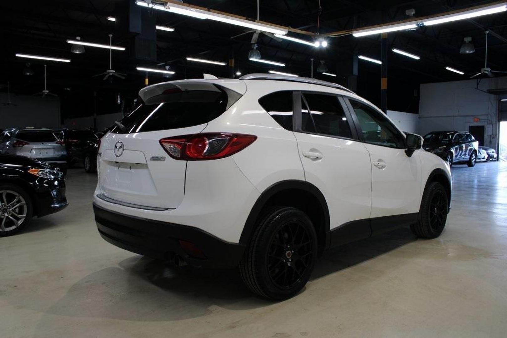 2014 Crystal White Pearl Mica /Sand Mazda CX-5 Grand Touring (JM3KE2DY2E0) with an SKYACTIV 2.5L 4-Cylinder DOHC 16V engine, Automatic transmission, located at 15300 Midway Rd., Addison, TX, 75001, (972) 702-0011, 32.958321, -96.838074 - Photo#2