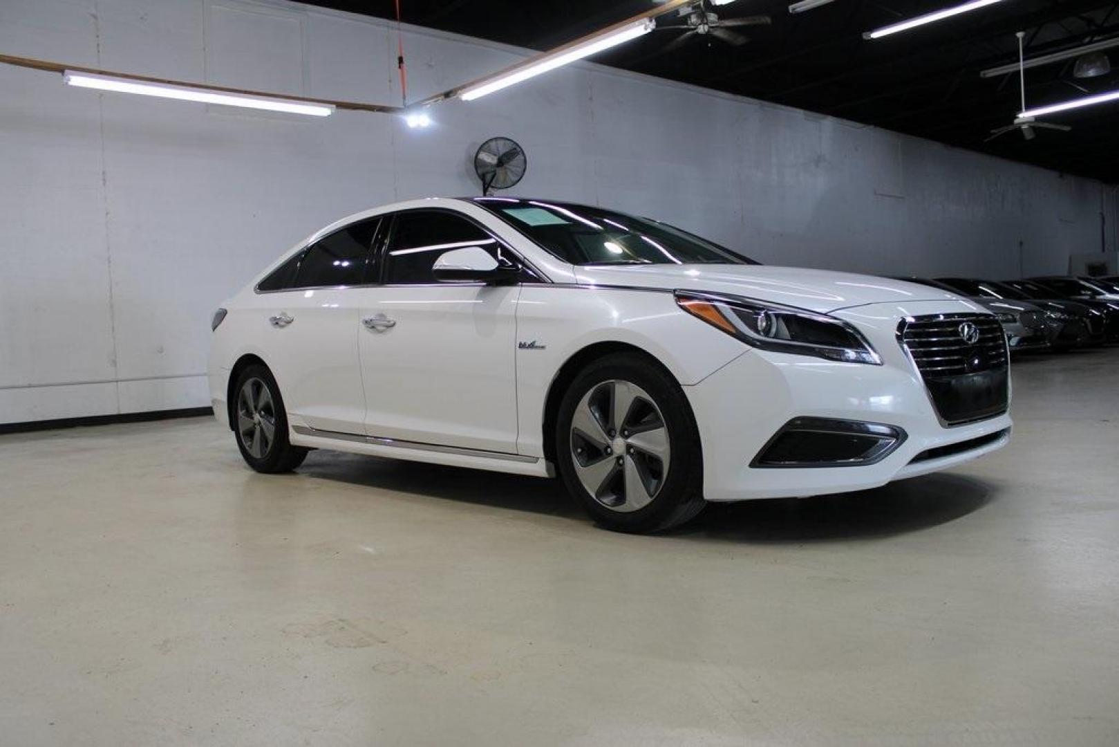 2016 Diamond White Pearl /Gray Hyundai Sonata Hybrid Limited (KMHE34L11GA) with an 2.0L I4 DGI Hybrid DOHC 16V SULEV II engine, Automatic transmission, located at 15300 Midway Rd., Addison, TX, 75001, (972) 702-0011, 32.958321, -96.838074 - Photo#6