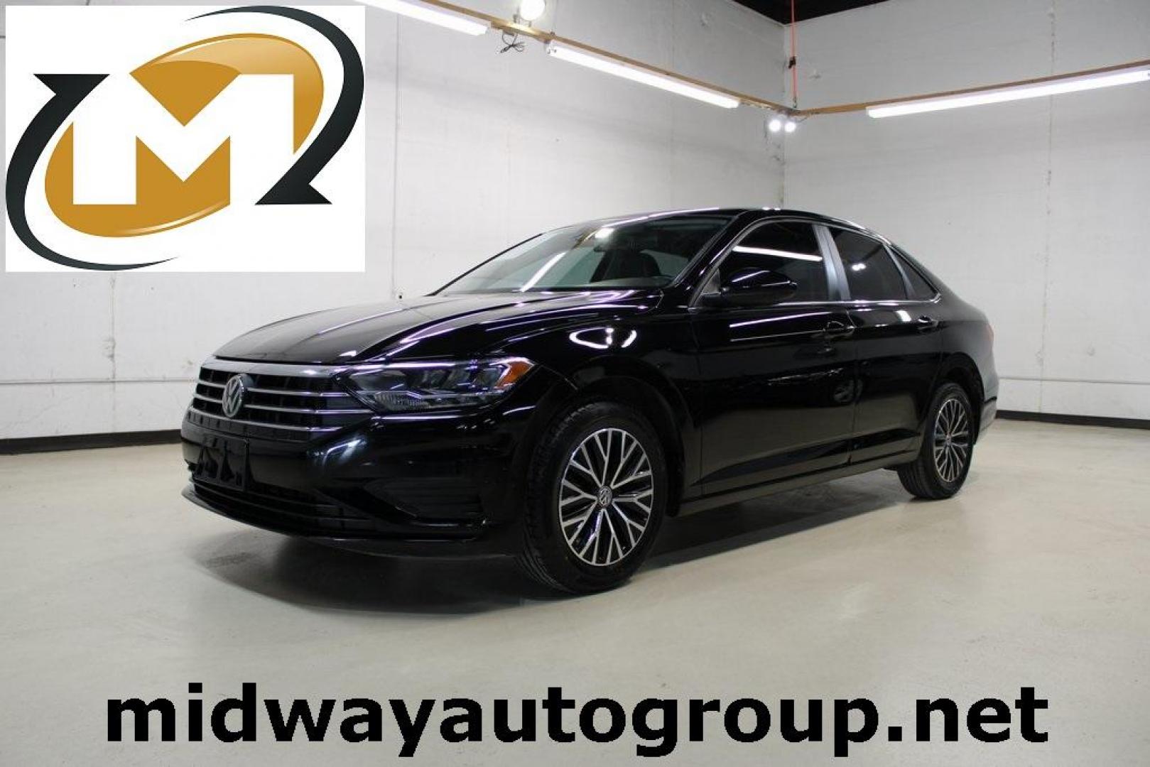 2019 /Titan Black Volkswagen Jetta 1.4T SE (3VWC57BU0KM) with an 1.4L TSI engine, Automatic transmission, located at 15300 Midway Rd., Addison, TX, 75001, (972) 702-0011, 32.958321, -96.838074 - HOME OF THE NO HAGGLE PRICE - WHOLESALE PRICES TO THE PUBLIC!! Jetta 1.4T SE, 4D Sedan, 1.4L TSI, 8-Speed Automatic with Tiptronic, FWD.<br><br>2019 Volkswagen Jetta 1.4T SE<br><br>30/40 City/Highway MPG<br><br>Awards:<br> * 2019 KBB.com 10 Coolest New Cars Under $20,000 * 2019 KBB.com 10 Best Se - Photo#0