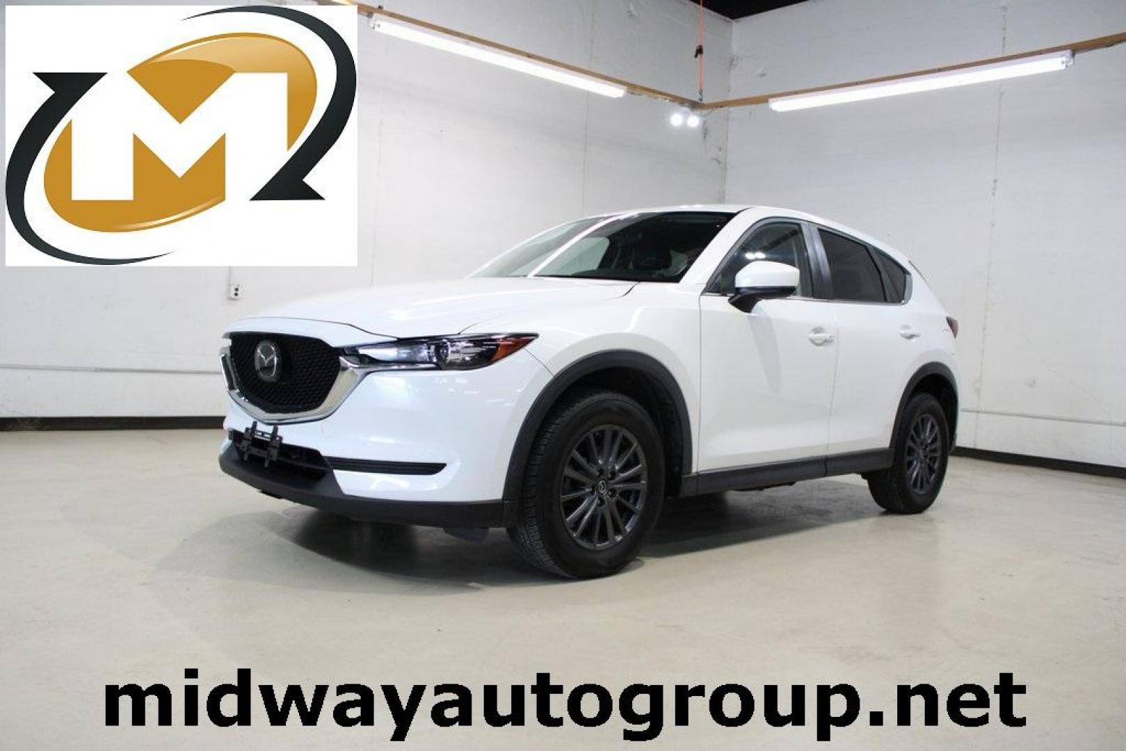 2019 Snowflake White Pearl Mica /Black Mazda CX-5 Touring (JM3KFACM9K1) with an SKYACTIV 2.5L 4-Cylinder DOHC 16V engine, Automatic transmission, located at 15300 Midway Rd., Addison, TX, 75001, (972) 702-0011, 32.958321, -96.838074 - Photo#0