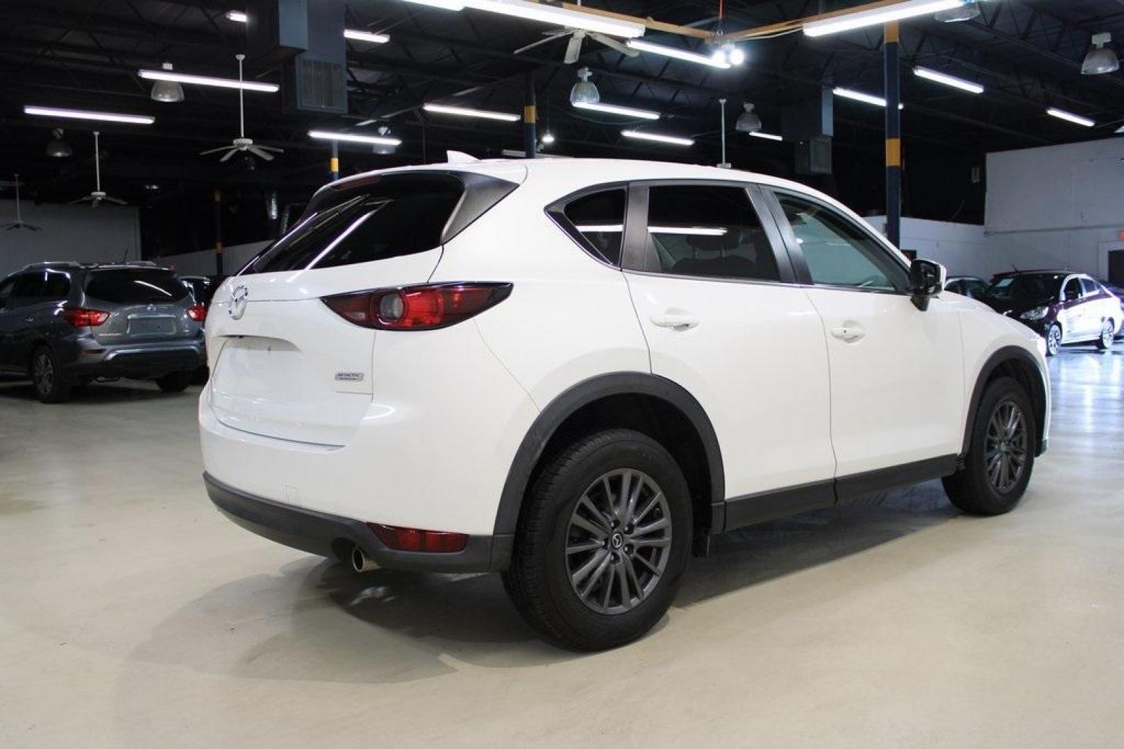 2019 Snowflake White Pearl Mica /Black Mazda CX-5 Touring (JM3KFACM9K1) with an SKYACTIV 2.5L 4-Cylinder DOHC 16V engine, Automatic transmission, located at 15300 Midway Rd., Addison, TX, 75001, (972) 702-0011, 32.958321, -96.838074 - Photo#2