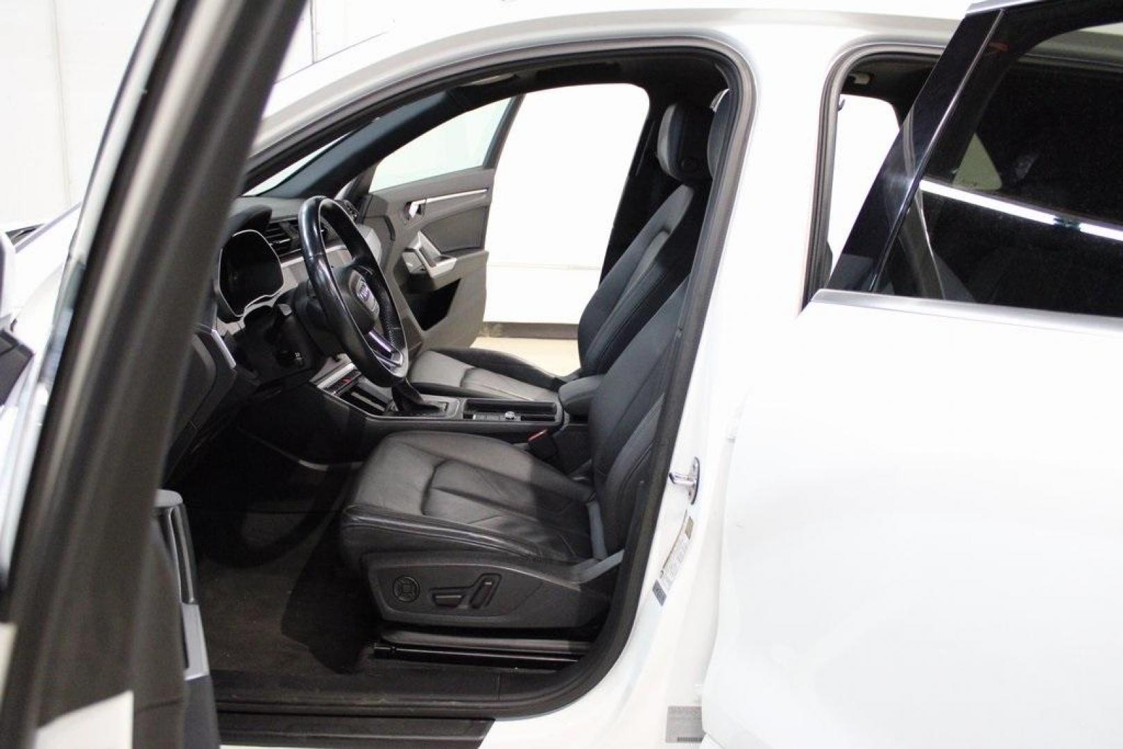 2020 White /Black Audi Q3 Premium (WA1AECF34L1) with an 2.0L 4-Cylinder TFSI engine, Automatic transmission, located at 15300 Midway Rd., Addison, TX, 75001, (972) 702-0011, 32.958321, -96.838074 - HOME OF THE NO HAGGLE PRICE - WHOLESALE PRICES TO THE PUBLIC!! Q3 Premium quattro, 4D Sport Utility, 2.0L 4-Cylinder TFSI, 8-Speed Automatic with Tiptronic, quattro, White, Leather.<br><br>White 2020 Audi Q3 Premium<br><br>19/27 City/Highway MPG<br><br>Awards:<br> * 2020 KBB.com Best Buy Awards<br> - Photo#16