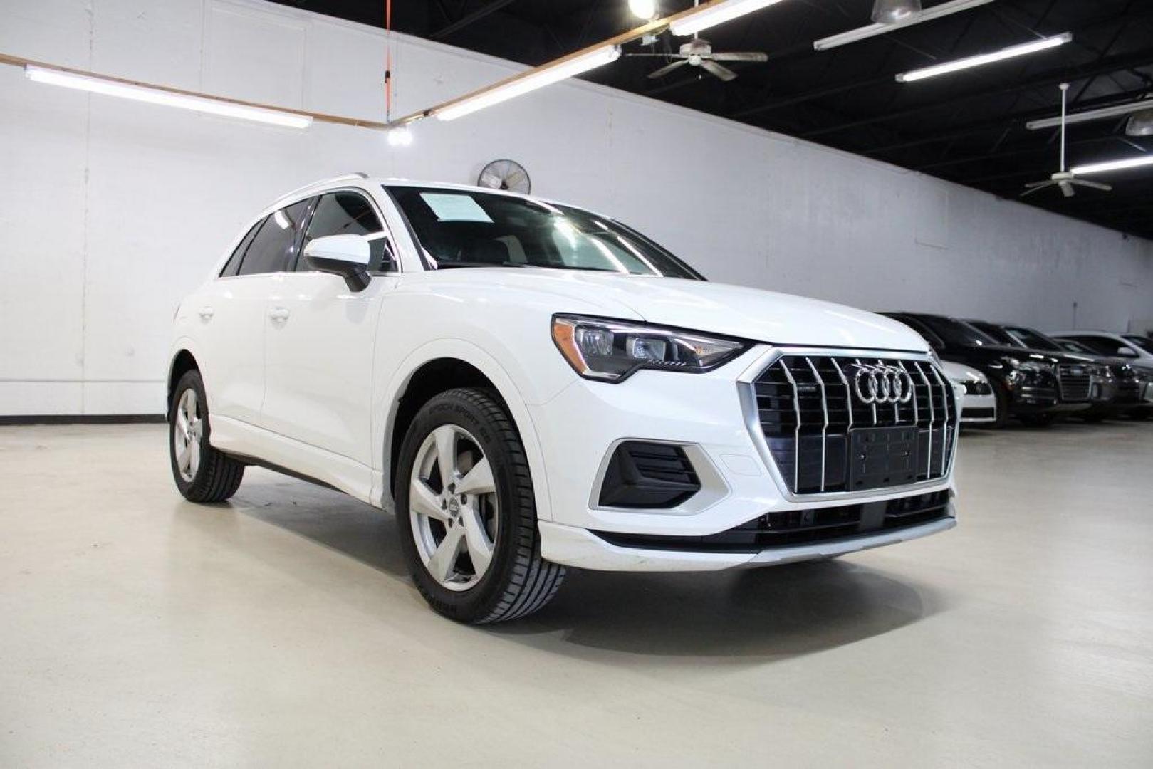 2020 White /Black Audi Q3 Premium (WA1AECF34L1) with an 2.0L 4-Cylinder TFSI engine, Automatic transmission, located at 15300 Midway Rd., Addison, TX, 75001, (972) 702-0011, 32.958321, -96.838074 - HOME OF THE NO HAGGLE PRICE - WHOLESALE PRICES TO THE PUBLIC!! Q3 Premium quattro, 4D Sport Utility, 2.0L 4-Cylinder TFSI, 8-Speed Automatic with Tiptronic, quattro, White, Leather.<br><br>White 2020 Audi Q3 Premium<br><br>19/27 City/Highway MPG<br><br>Awards:<br> * 2020 KBB.com Best Buy Awards<br> - Photo#1