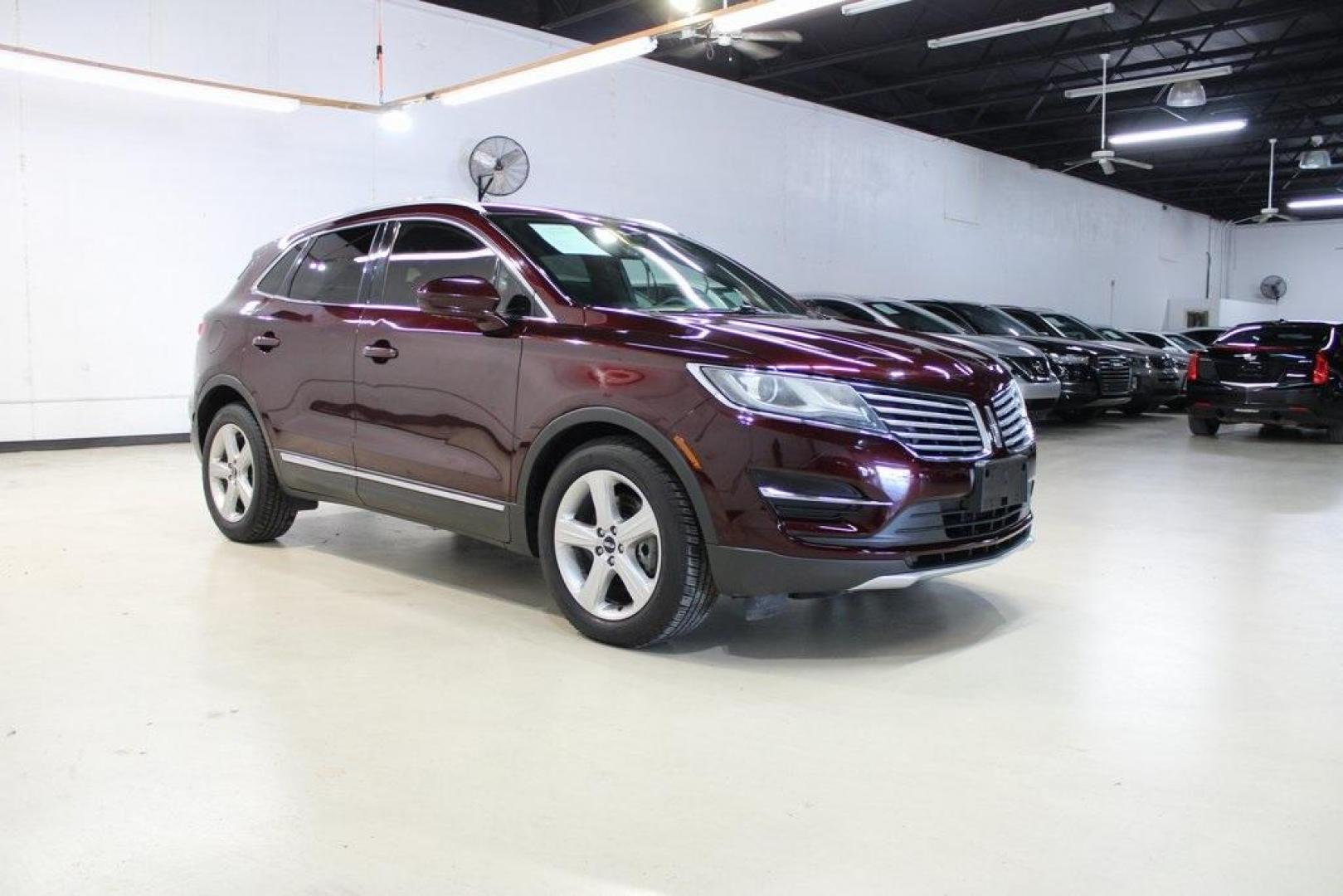 2018 Burgundy /Ebony Lincoln MKC Premiere (5LMCJ1C99JU) with an 2.0L Turbocharged engine, Automatic transmission, located at 15300 Midway Rd., Addison, TX, 75001, (972) 702-0011, 32.958321, -96.838074 - Photo#6