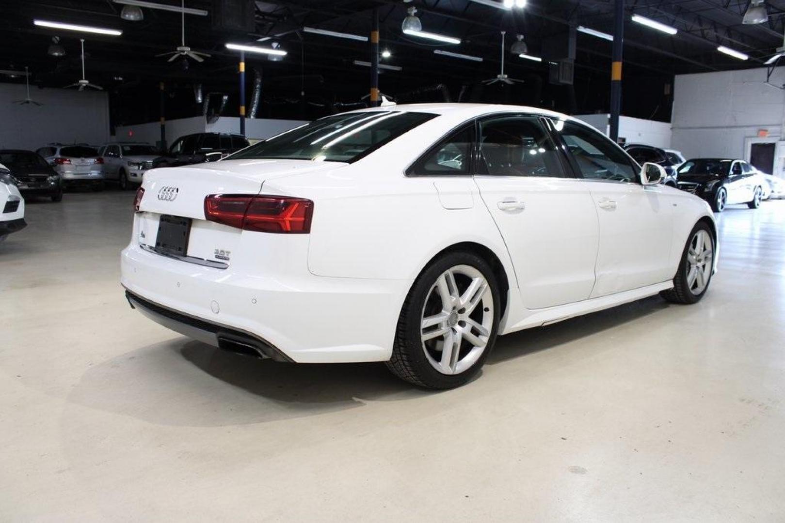 2016 White /Nougat Brown Audi A6 2.0T Premium Plus (WAUGFAFC3GN) with an 2.0L 4-Cylinder TFSI engine, Automatic transmission, located at 15300 Midway Rd., Addison, TX, 75001, (972) 702-0011, 32.958321, -96.838074 - HOME OF THE NO HAGGLE PRICE - WHOLESALE PRICES TO THE PUBLIC!! A6 2.0T Premium Plus quattro, 4D Sedan, 2.0L 4-Cylinder TFSI, 8-Speed Automatic with Tiptronic, quattro, White, Leather.<br><br>White 2016 Audi A6 2.0T Premium Plus<br><br>Recent Arrival! 22/32 City/Highway MPG<br><br>Awards:<br> * JD P - Photo#2