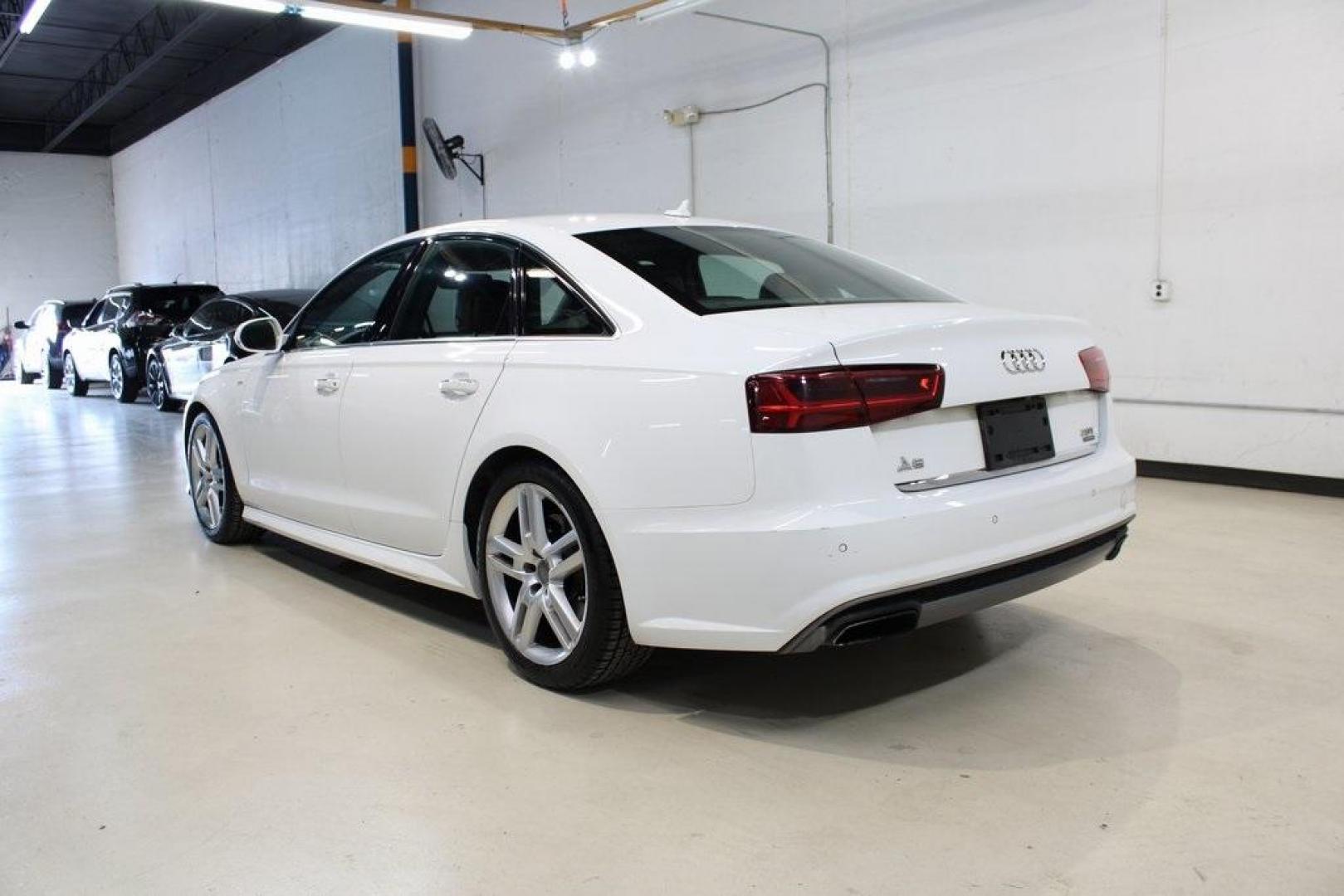 2016 White /Nougat Brown Audi A6 2.0T Premium Plus (WAUGFAFC3GN) with an 2.0L 4-Cylinder TFSI engine, Automatic transmission, located at 15300 Midway Rd., Addison, TX, 75001, (972) 702-0011, 32.958321, -96.838074 - HOME OF THE NO HAGGLE PRICE - WHOLESALE PRICES TO THE PUBLIC!! A6 2.0T Premium Plus quattro, 4D Sedan, 2.0L 4-Cylinder TFSI, 8-Speed Automatic with Tiptronic, quattro, White, Leather.<br><br>White 2016 Audi A6 2.0T Premium Plus<br><br>Recent Arrival! 22/32 City/Highway MPG<br><br>Awards:<br> * JD P - Photo#3