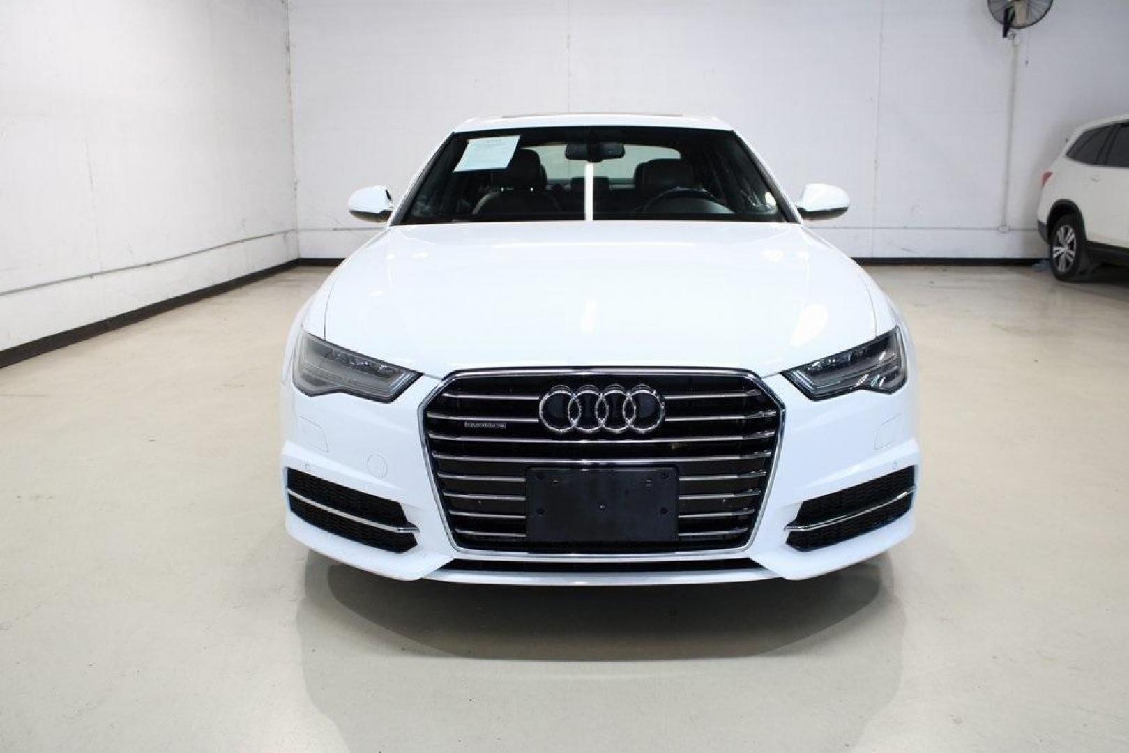 2016 White /Nougat Brown Audi A6 2.0T Premium Plus (WAUGFAFC3GN) with an 2.0L 4-Cylinder TFSI engine, Automatic transmission, located at 15300 Midway Rd., Addison, TX, 75001, (972) 702-0011, 32.958321, -96.838074 - HOME OF THE NO HAGGLE PRICE - WHOLESALE PRICES TO THE PUBLIC!! A6 2.0T Premium Plus quattro, 4D Sedan, 2.0L 4-Cylinder TFSI, 8-Speed Automatic with Tiptronic, quattro, White, Leather.<br><br>White 2016 Audi A6 2.0T Premium Plus<br><br>Recent Arrival! 22/32 City/Highway MPG<br><br>Awards:<br> * JD P - Photo#5