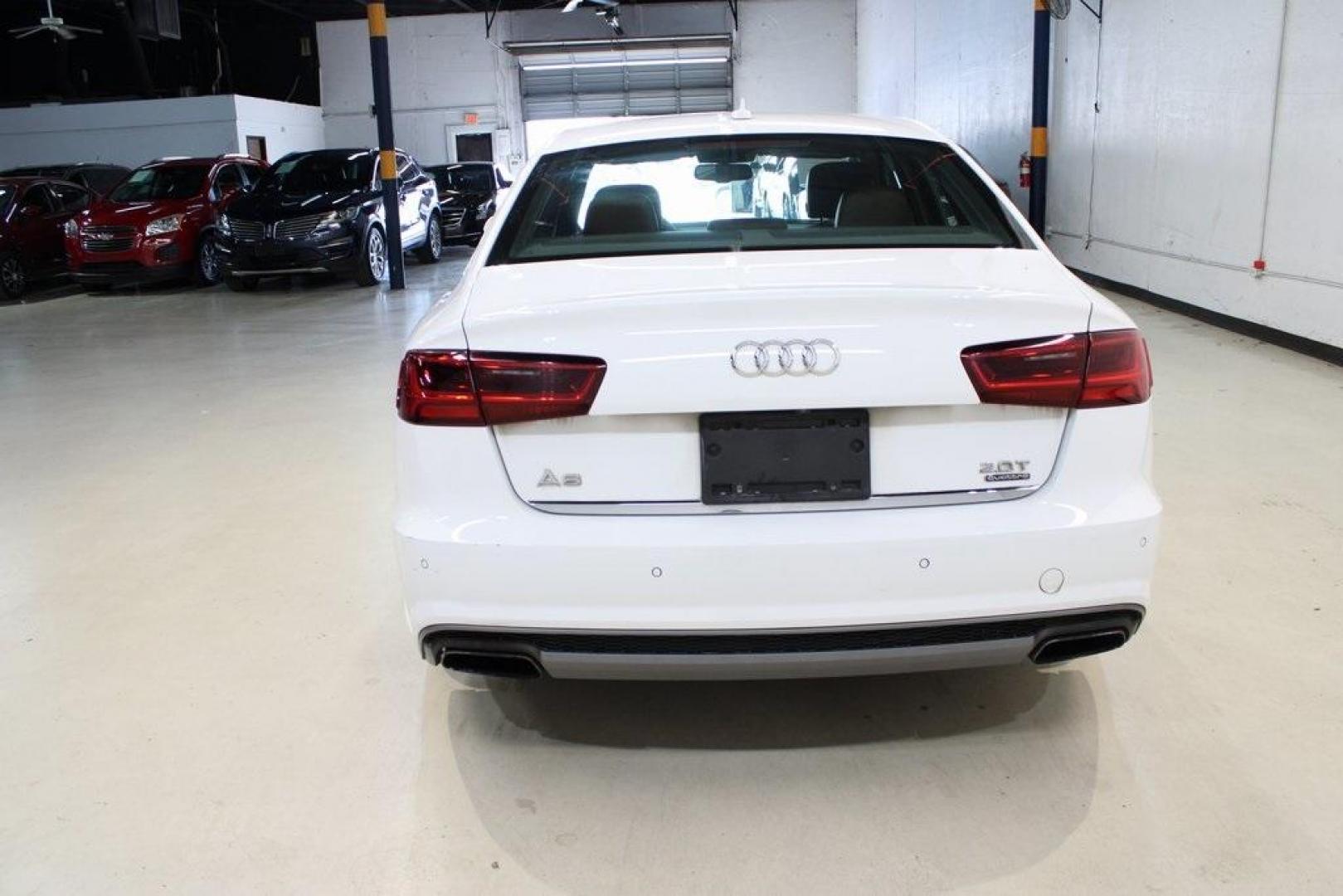 2016 White /Nougat Brown Audi A6 2.0T Premium Plus (WAUGFAFC3GN) with an 2.0L 4-Cylinder TFSI engine, Automatic transmission, located at 15300 Midway Rd., Addison, TX, 75001, (972) 702-0011, 32.958321, -96.838074 - HOME OF THE NO HAGGLE PRICE - WHOLESALE PRICES TO THE PUBLIC!! A6 2.0T Premium Plus quattro, 4D Sedan, 2.0L 4-Cylinder TFSI, 8-Speed Automatic with Tiptronic, quattro, White, Leather.<br><br>White 2016 Audi A6 2.0T Premium Plus<br><br>Recent Arrival! 22/32 City/Highway MPG<br><br>Awards:<br> * JD P - Photo#7