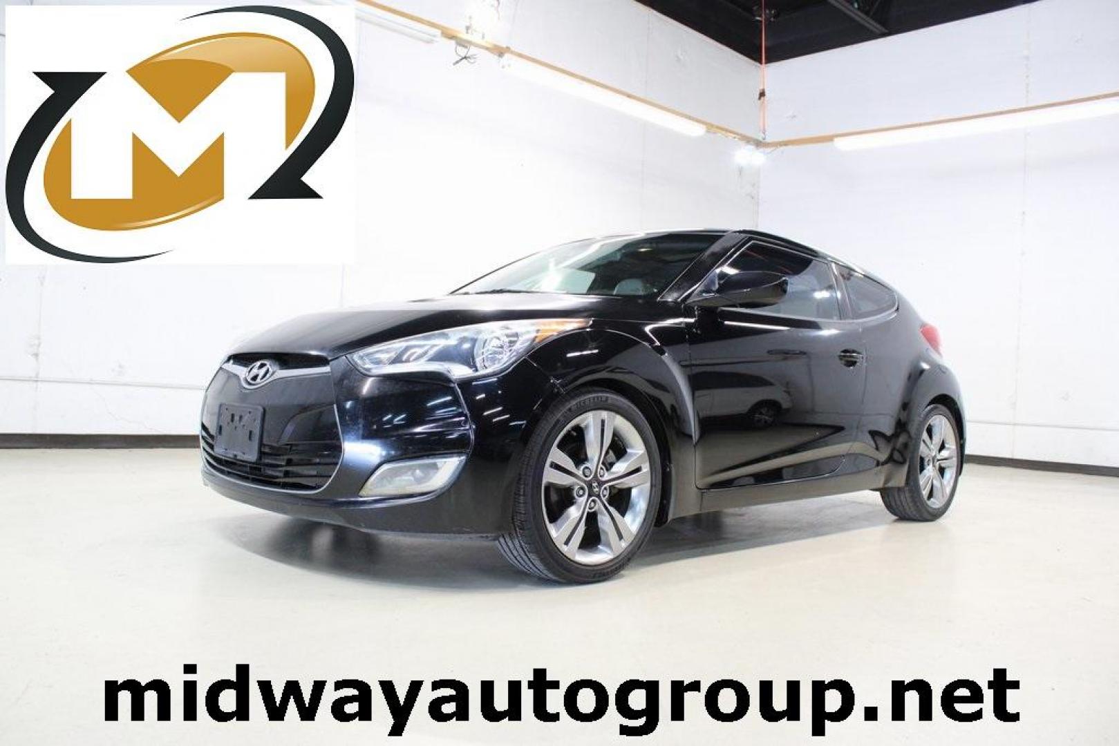 2012 Ultra Black /Gray Hyundai Veloster Base (KMHTC6ADXCU) with an 1.6L 4-Cylinder DGI DOHC engine, Automatic transmission, located at 15300 Midway Rd., Addison, TX, 75001, (972) 702-0011, 32.958321, -96.838074 - Photo#0