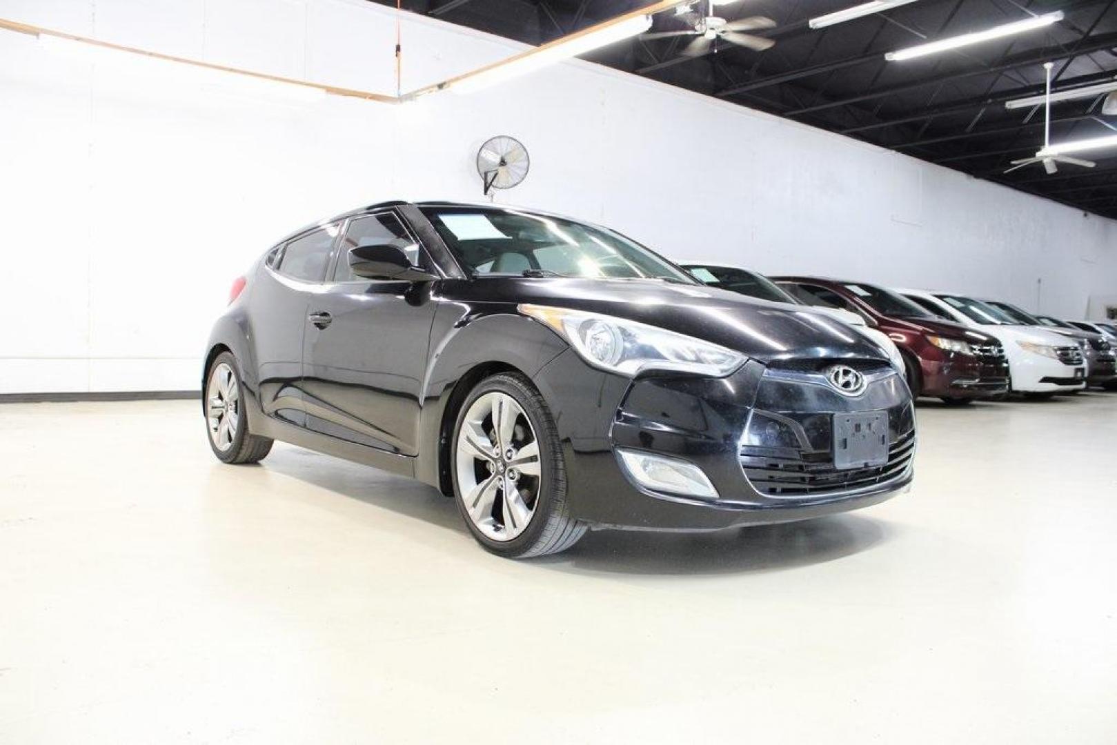 2012 Ultra Black /Gray Hyundai Veloster Base (KMHTC6ADXCU) with an 1.6L 4-Cylinder DGI DOHC engine, Automatic transmission, located at 15300 Midway Rd., Addison, TX, 75001, (972) 702-0011, 32.958321, -96.838074 - Photo#1