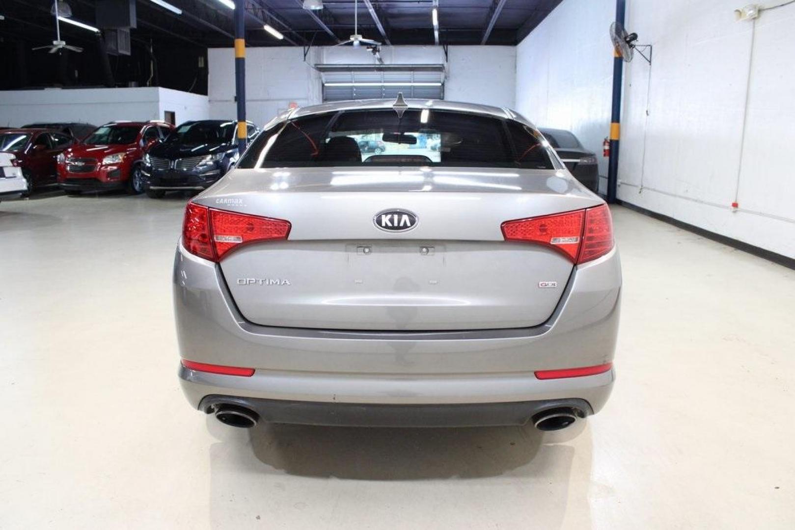 2013 Titanium Silver /Gray Kia Optima LX (5XXGM4A72DG) with an 2.4L I4 DGI DOHC engine, Automatic transmission, located at 15300 Midway Rd., Addison, TX, 75001, (972) 702-0011, 32.958321, -96.838074 - HOME OF THE NO HAGGLE PRICE - WHOLESALE PRICES TO THE PUBLIC!! Optima LX, 4D Sedan, 2.4L I4 DGI DOHC, 6-Speed Automatic with Sportmatic, FWD, Titanium Silver, Gray Cloth. Odometer is 23283 miles below market average!<br><br>Titanium Silver 2013 Kia Optima LX<br><br>Recent Arrival! 24/35 City/Highway - Photo#7