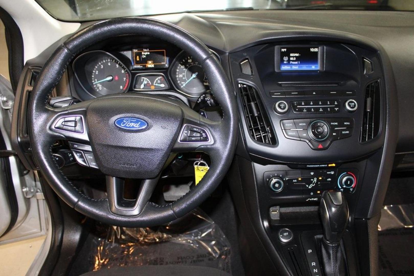 2016 Ingot Silver /Charcoal Ford Focus SE (1FADP3K21GL) with an 2.0L 4-Cylinder DGI DOHC engine, located at 15300 Midway Rd., Addison, TX, 75001, (972) 702-0011, 32.958321, -96.838074 - Photo#16