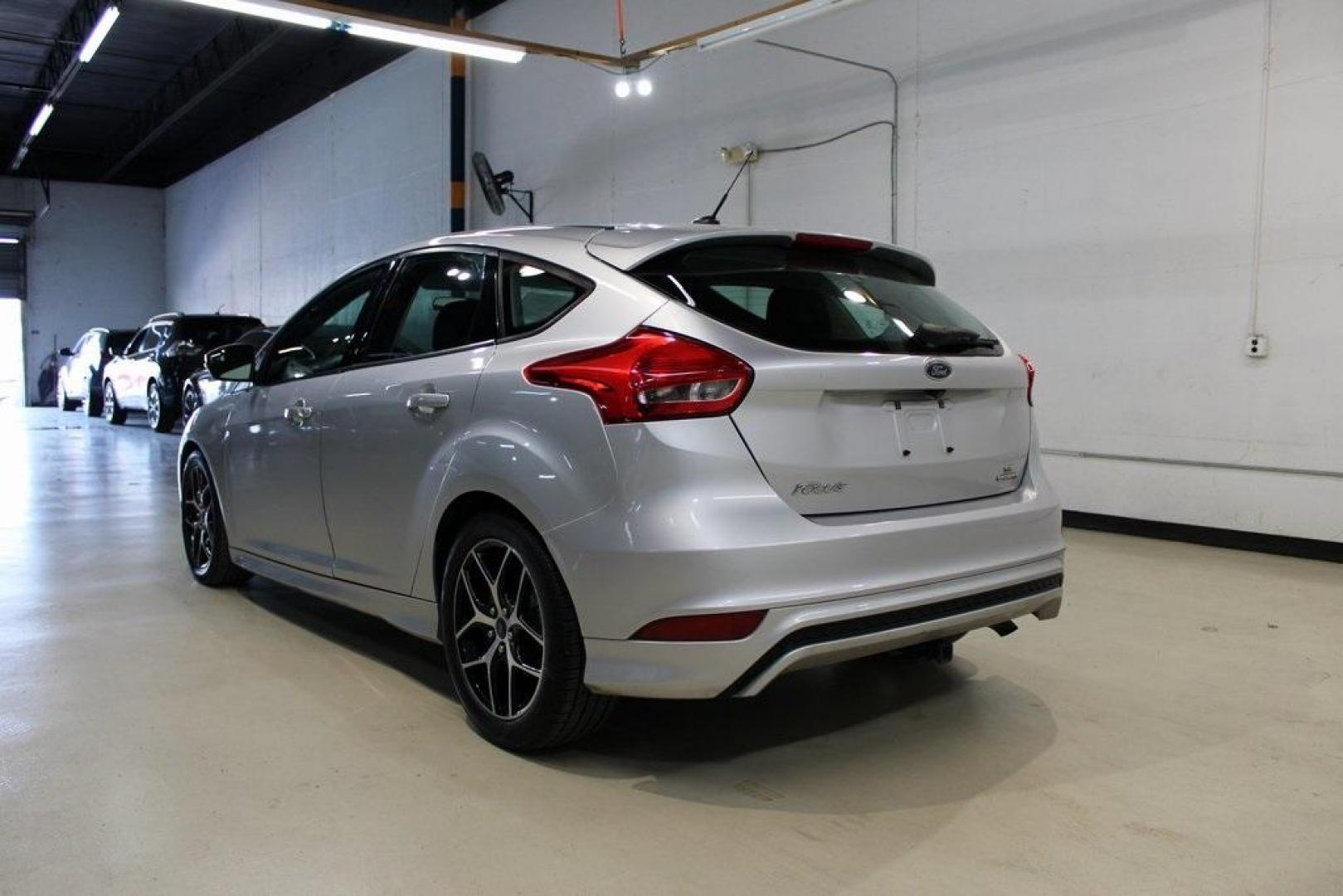 2016 Ingot Silver /Charcoal Ford Focus SE (1FADP3K21GL) with an 2.0L 4-Cylinder DGI DOHC engine, located at 15300 Midway Rd., Addison, TX, 75001, (972) 702-0011, 32.958321, -96.838074 - Photo#3