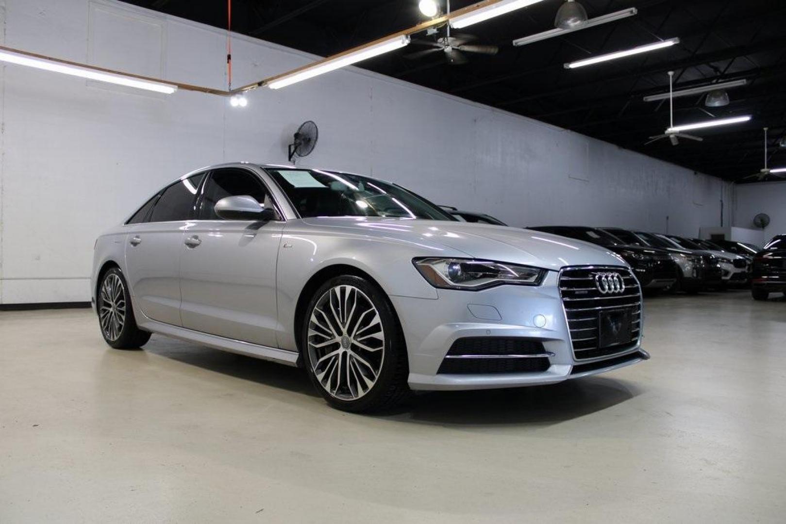 2016 Gray Metallic /Black Audi A6 2.0T Premium Plus (WAUGFAFC0GN) with an 2.0L 4-Cylinder TFSI engine, Automatic transmission, located at 15300 Midway Rd., Addison, TX, 75001, (972) 702-0011, 32.958321, -96.838074 - Photo#1