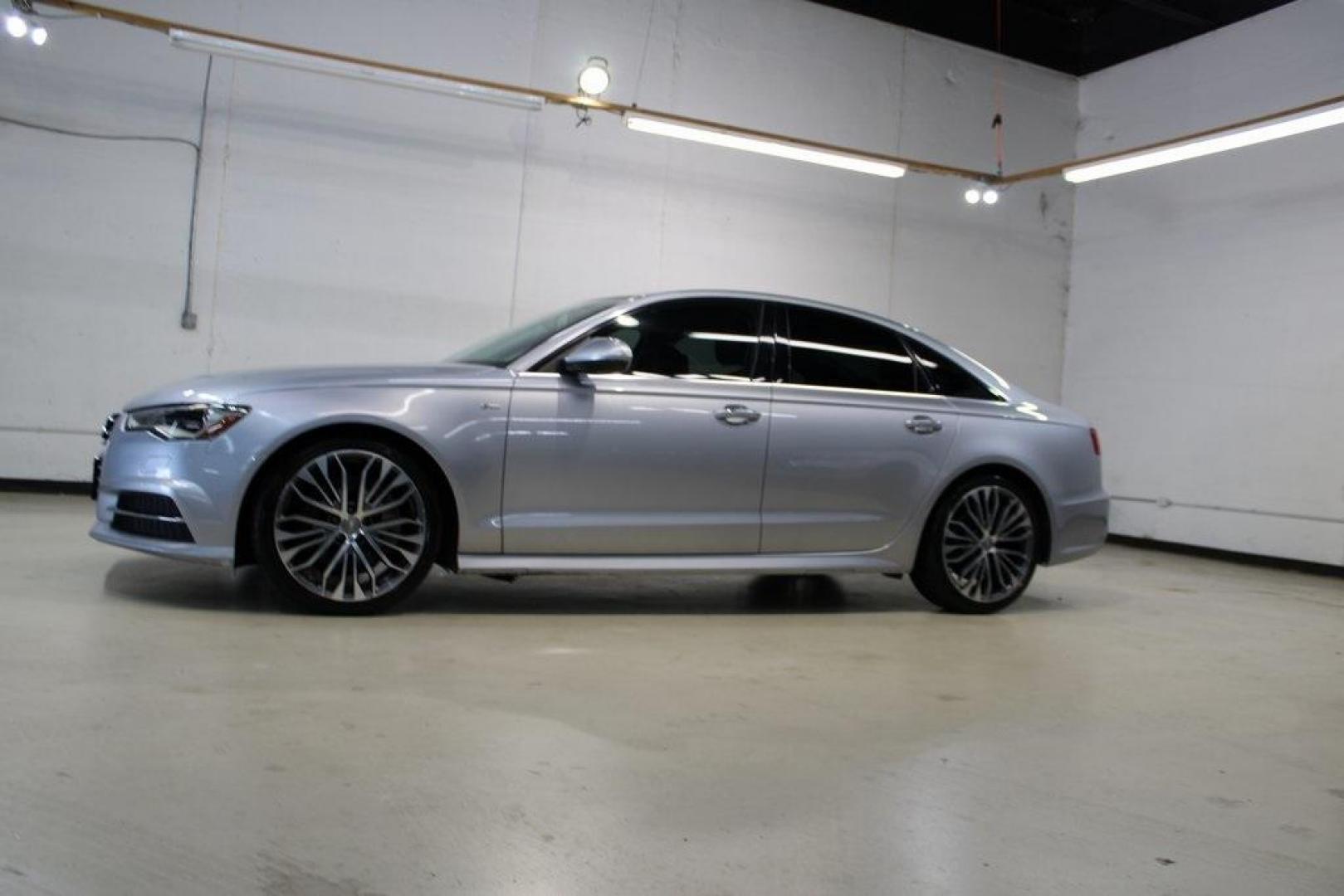 2016 Gray Metallic /Black Audi A6 2.0T Premium Plus (WAUGFAFC0GN) with an 2.0L 4-Cylinder TFSI engine, Automatic transmission, located at 15300 Midway Rd., Addison, TX, 75001, (972) 702-0011, 32.958321, -96.838074 - Photo#4