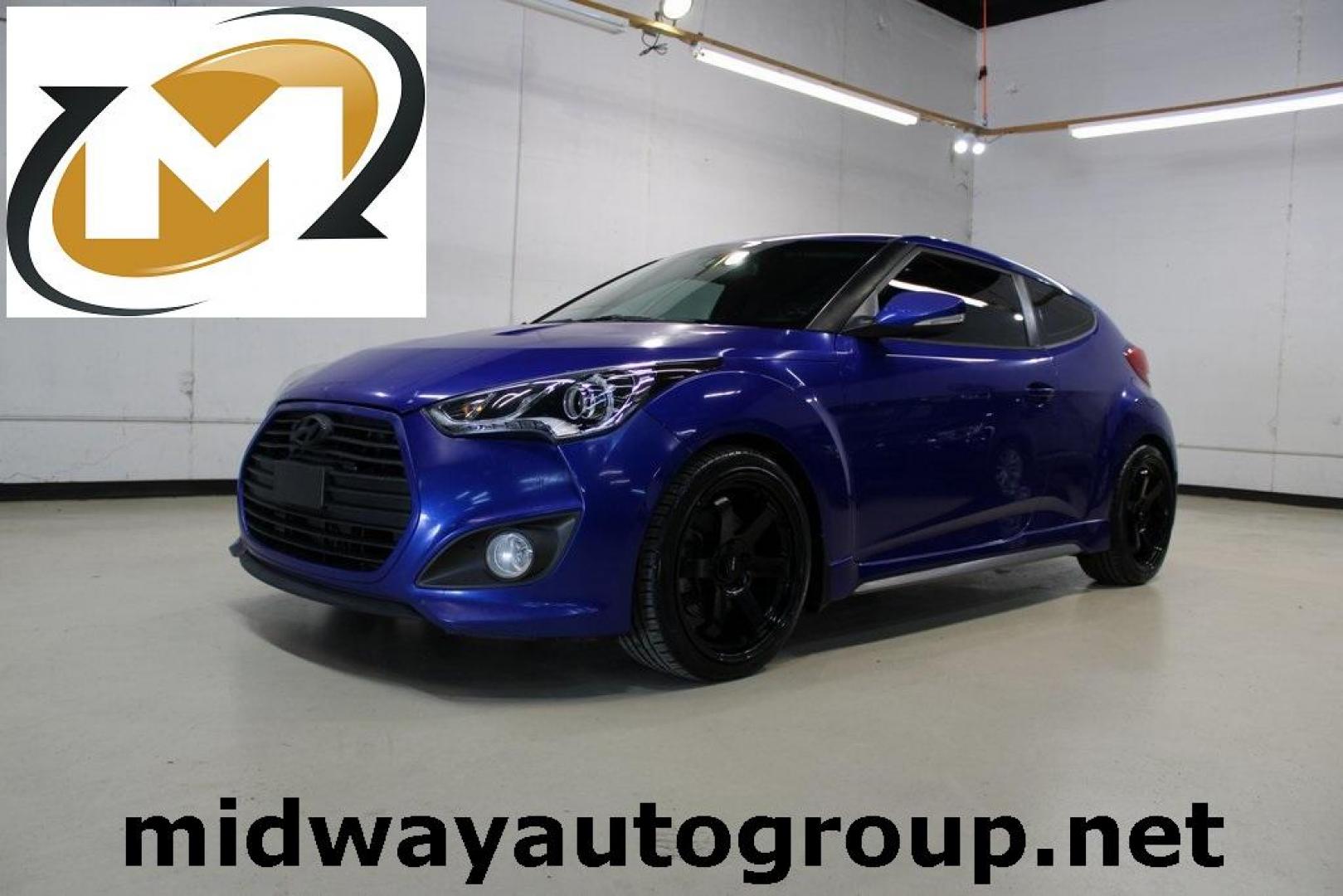 2014 Marathon Blue Pearl /Black Hyundai Veloster Turbo (KMHTC6AE7EU) with an 1.6L I4 DGI DOHC 16V Turbocharged engine, Manual transmission, located at 15300 Midway Rd., Addison, TX, 75001, (972) 702-0011, 32.958321, -96.838074 - HOME OF THE NO HAGGLE PRICE - WHOLESALE PRICES TO THE PUBLIC!! Veloster Turbo w/Black, 3D Hatchback, 1.6L I4 DGI DOHC 16V Turbocharged, 6-Speed Manual, FWD, Marathon Blue Pearl, Black Leather.<br><br>Marathon Blue Pearl 2014 Hyundai Veloster Turbo<br><br>Recent Arrival! 24/33 City/Highway MPG<br><br - Photo#0