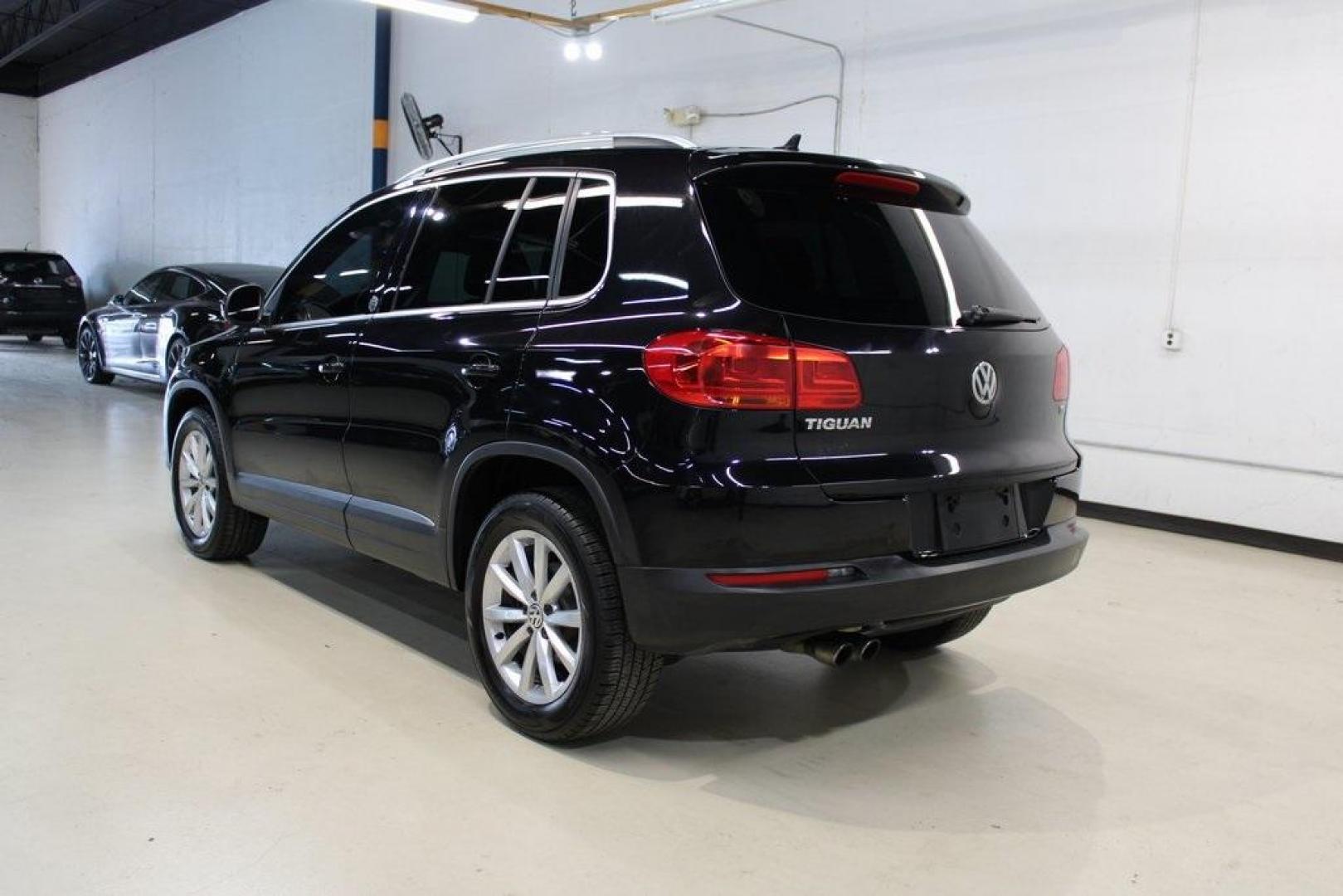 2017 Deep Black Pearl /Charcoal Black, Leat Volkswagen Tiguan Wolfsburg (WVGRV7AX4HW) with an 2.0L TSI DOHC engine, Automatic transmission, located at 15300 Midway Rd., Addison, TX, 75001, (972) 702-0011, 32.958321, -96.838074 - Photo#3