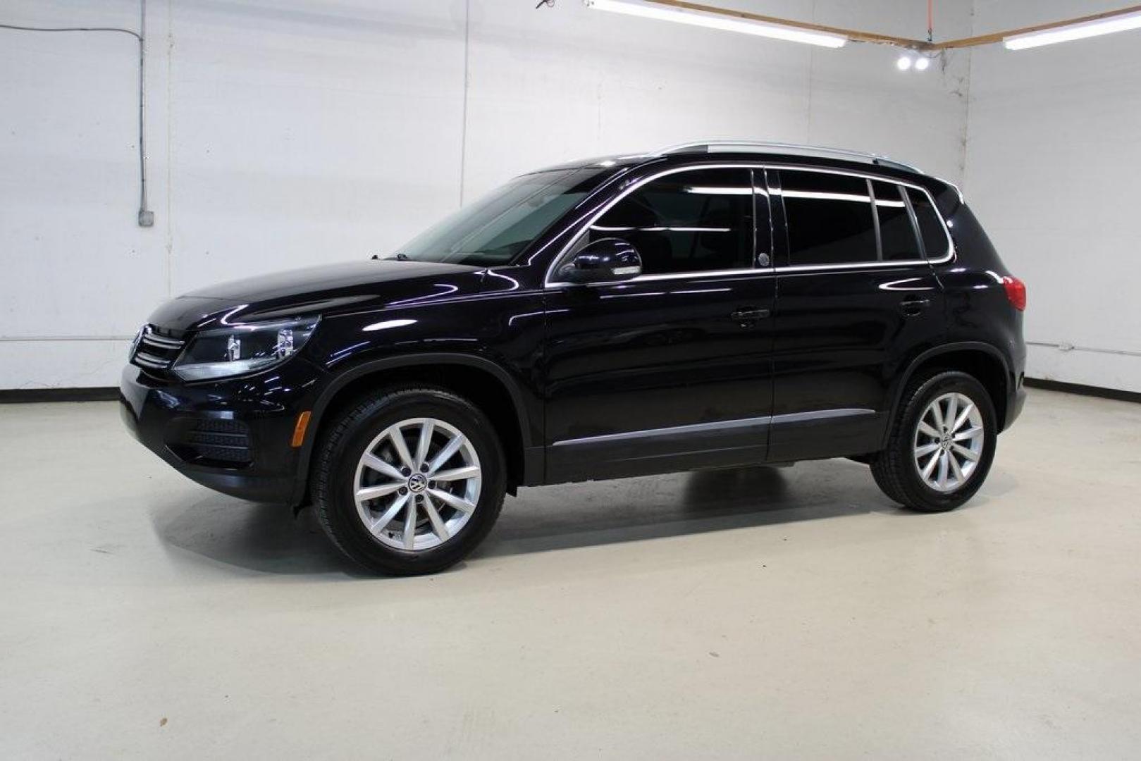 2017 Deep Black Pearl /Charcoal Black, Leat Volkswagen Tiguan Wolfsburg (WVGRV7AX4HW) with an 2.0L TSI DOHC engine, Automatic transmission, located at 15300 Midway Rd., Addison, TX, 75001, (972) 702-0011, 32.958321, -96.838074 - Photo#4