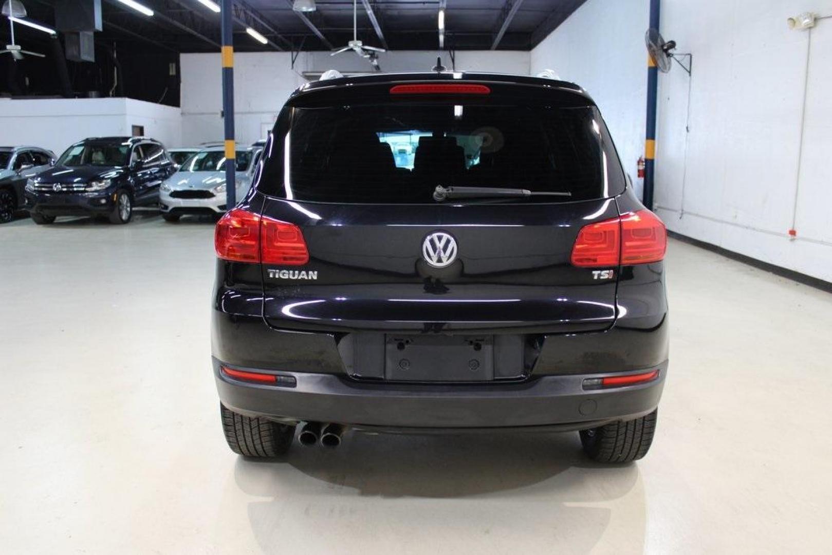 2017 Deep Black Pearl /Charcoal Black, Leat Volkswagen Tiguan Wolfsburg (WVGRV7AX4HW) with an 2.0L TSI DOHC engine, Automatic transmission, located at 15300 Midway Rd., Addison, TX, 75001, (972) 702-0011, 32.958321, -96.838074 - Photo#7