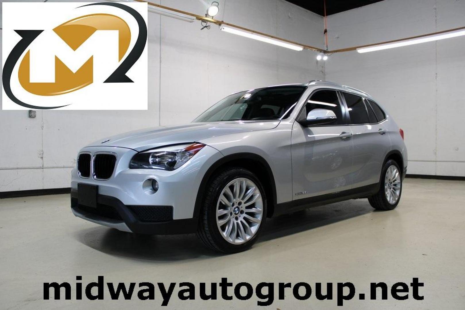 2014 Glacier Silver Metallic /Black BMW X1 xDrive28i (WBAVL1C58EV) with an 2.0L 4-Cylinder DOHC 16V TwinPower Turbo engine, Automatic transmission, located at 15300 Midway Rd., Addison, TX, 75001, (972) 702-0011, 32.958321, -96.838074 - HOME OF THE NO HAGGLE PRICE - WHOLESALE PRICES TO THE PUBLIC!! X1 xDrive28i, 4D Sport Utility, 2.0L 4-Cylinder DOHC 16V TwinPower Turbo, 8-Speed Automatic Steptronic, AWD, Glacier Silver Metallic, Black Leather.<br><br>Glacier Silver Metallic 2014 BMW X1 xDrive28i<br><br>22/33 City/Highway MPG<br><b - Photo#0