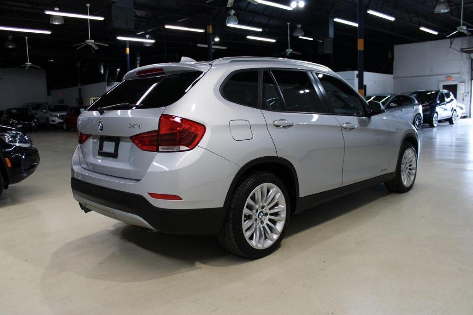 2014 Glacier Silver Metallic /Black BMW X1 xDrive28i (WBAVL1C58EV) with an 2.0L 4-Cylinder DOHC 16V TwinPower Turbo engine, Automatic transmission, located at 15300 Midway Rd., Addison, TX, 75001, (972) 702-0011, 32.958321, -96.838074 - HOME OF THE NO HAGGLE PRICE - WHOLESALE PRICES TO THE PUBLIC!! X1 xDrive28i, 4D Sport Utility, 2.0L 4-Cylinder DOHC 16V TwinPower Turbo, 8-Speed Automatic Steptronic, AWD, Glacier Silver Metallic, Black Leather.<br><br>Glacier Silver Metallic 2014 BMW X1 xDrive28i<br><br>22/33 City/Highway MPG<br><b - Photo#2