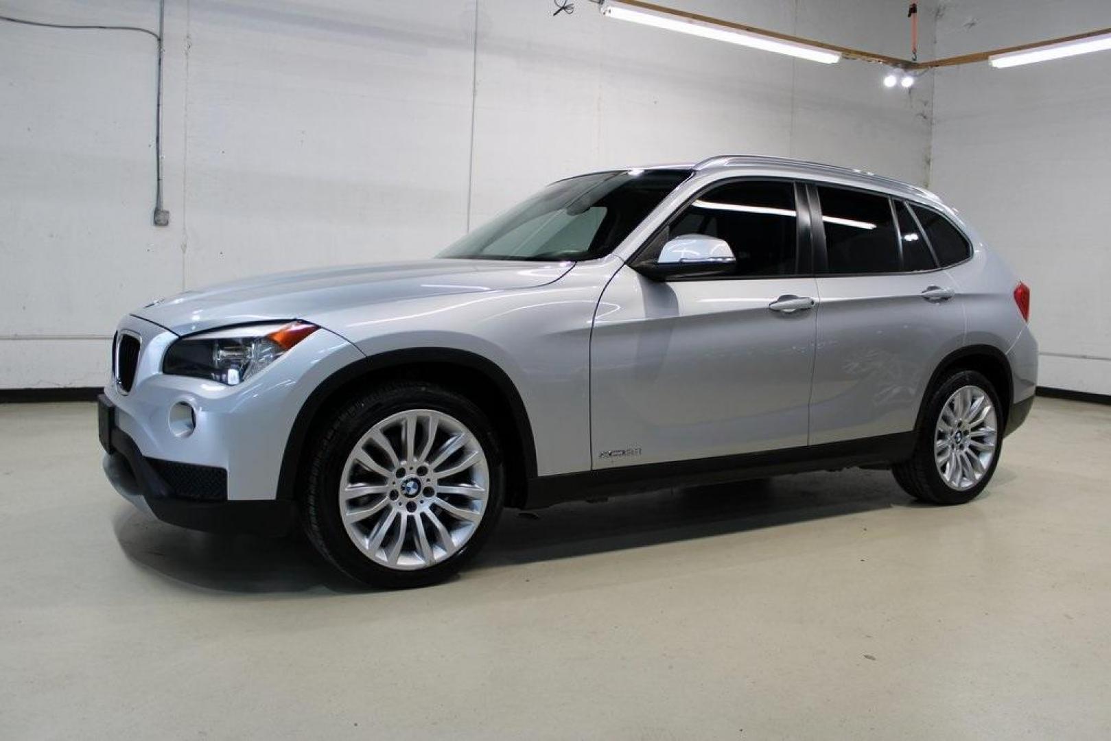 2014 Glacier Silver Metallic /Black BMW X1 xDrive28i (WBAVL1C58EV) with an 2.0L 4-Cylinder DOHC 16V TwinPower Turbo engine, Automatic transmission, located at 15300 Midway Rd., Addison, TX, 75001, (972) 702-0011, 32.958321, -96.838074 - HOME OF THE NO HAGGLE PRICE - WHOLESALE PRICES TO THE PUBLIC!! X1 xDrive28i, 4D Sport Utility, 2.0L 4-Cylinder DOHC 16V TwinPower Turbo, 8-Speed Automatic Steptronic, AWD, Glacier Silver Metallic, Black Leather.<br><br>Glacier Silver Metallic 2014 BMW X1 xDrive28i<br><br>22/33 City/Highway MPG<br><b - Photo#4