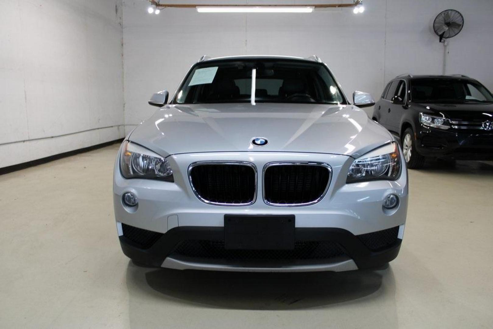 2014 Glacier Silver Metallic /Black BMW X1 xDrive28i (WBAVL1C58EV) with an 2.0L 4-Cylinder DOHC 16V TwinPower Turbo engine, Automatic transmission, located at 15300 Midway Rd., Addison, TX, 75001, (972) 702-0011, 32.958321, -96.838074 - HOME OF THE NO HAGGLE PRICE - WHOLESALE PRICES TO THE PUBLIC!! X1 xDrive28i, 4D Sport Utility, 2.0L 4-Cylinder DOHC 16V TwinPower Turbo, 8-Speed Automatic Steptronic, AWD, Glacier Silver Metallic, Black Leather.<br><br>Glacier Silver Metallic 2014 BMW X1 xDrive28i<br><br>22/33 City/Highway MPG<br><b - Photo#5