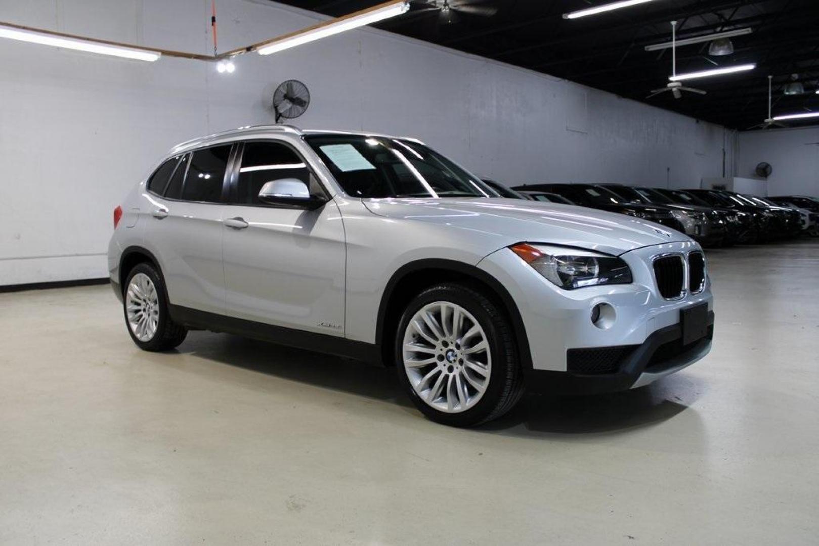 2014 Glacier Silver Metallic /Black BMW X1 xDrive28i (WBAVL1C58EV) with an 2.0L 4-Cylinder DOHC 16V TwinPower Turbo engine, Automatic transmission, located at 15300 Midway Rd., Addison, TX, 75001, (972) 702-0011, 32.958321, -96.838074 - HOME OF THE NO HAGGLE PRICE - WHOLESALE PRICES TO THE PUBLIC!! X1 xDrive28i, 4D Sport Utility, 2.0L 4-Cylinder DOHC 16V TwinPower Turbo, 8-Speed Automatic Steptronic, AWD, Glacier Silver Metallic, Black Leather.<br><br>Glacier Silver Metallic 2014 BMW X1 xDrive28i<br><br>22/33 City/Highway MPG<br><b - Photo#6