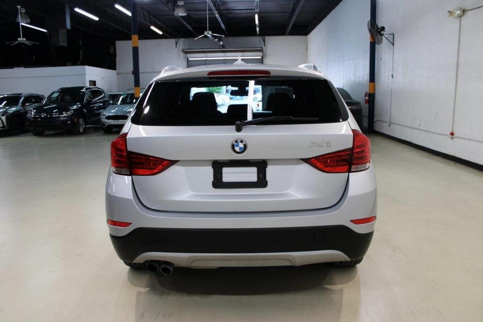 2014 Glacier Silver Metallic /Black BMW X1 xDrive28i (WBAVL1C58EV) with an 2.0L 4-Cylinder DOHC 16V TwinPower Turbo engine, Automatic transmission, located at 15300 Midway Rd., Addison, TX, 75001, (972) 702-0011, 32.958321, -96.838074 - HOME OF THE NO HAGGLE PRICE - WHOLESALE PRICES TO THE PUBLIC!! X1 xDrive28i, 4D Sport Utility, 2.0L 4-Cylinder DOHC 16V TwinPower Turbo, 8-Speed Automatic Steptronic, AWD, Glacier Silver Metallic, Black Leather.<br><br>Glacier Silver Metallic 2014 BMW X1 xDrive28i<br><br>22/33 City/Highway MPG<br><b - Photo#7