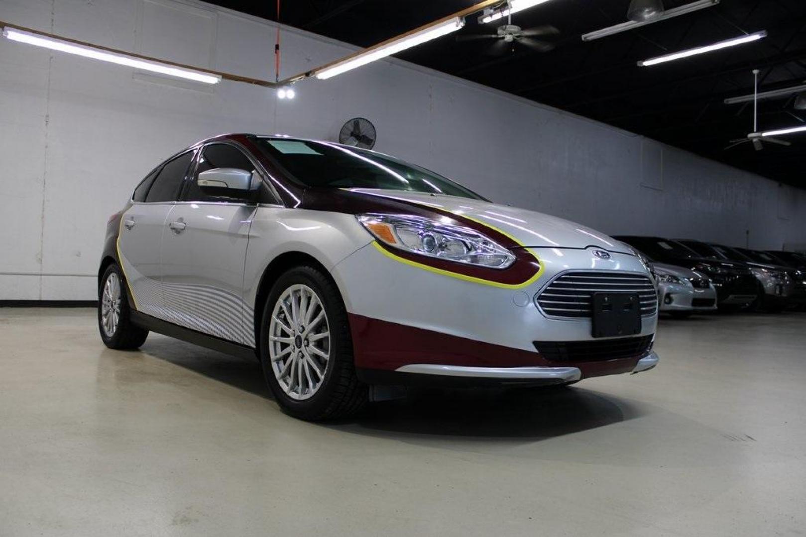 2014 Ingot Silver Metallic /Medium Light Stone Ford Focus Electric Base (1FADP3R42EL) with an 107kW Electric Motor engine, Automatic transmission, located at 15300 Midway Rd., Addison, TX, 75001, (972) 702-0011, 32.958321, -96.838074 - Photo#1