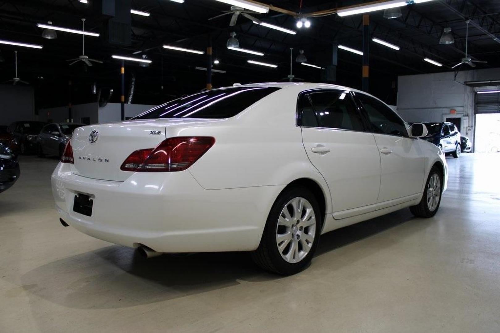 2010 Blizzard Pearl /Ivory Toyota Avalon XLS (4T1BK3DB1AU) with an 3.5L V6 SMPI DOHC engine, Automatic transmission, located at 15300 Midway Rd., Addison, TX, 75001, (972) 702-0011, 32.958321, -96.838074 - HOME OF THE NO HAGGLE PRICE - WHOLESALE PRICES TO THE PUBLIC!! Avalon XLS, 4D Sedan, 3.5L V6 SMPI DOHC, 6-Speed Automatic Electronic with Overdrive, FWD, White, Leather.<br><br>White 2010 Toyota Avalon XLS<br><br>Recent Arrival! 19/28 City/Highway MPG<br><br>Awards:<br> * 2010 KBB.com 10 Most Comfo - Photo#2