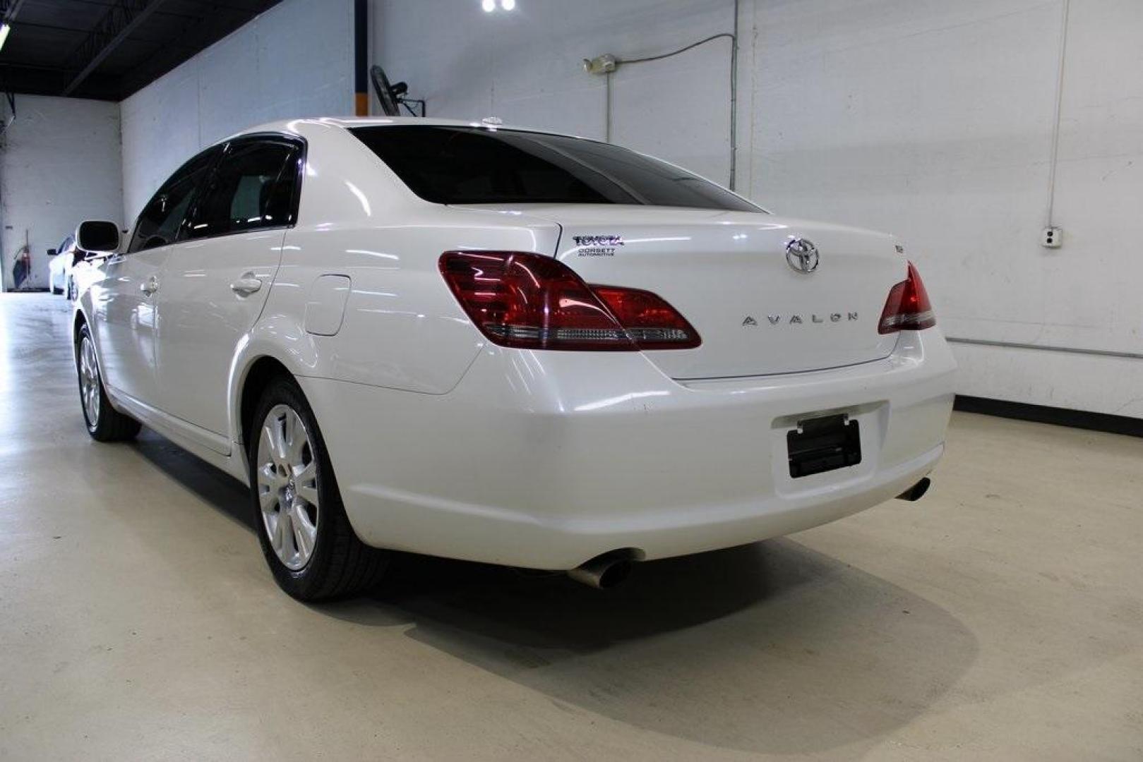 2010 Blizzard Pearl /Ivory Toyota Avalon XLS (4T1BK3DB1AU) with an 3.5L V6 SMPI DOHC engine, Automatic transmission, located at 15300 Midway Rd., Addison, TX, 75001, (972) 702-0011, 32.958321, -96.838074 - HOME OF THE NO HAGGLE PRICE - WHOLESALE PRICES TO THE PUBLIC!! Avalon XLS, 4D Sedan, 3.5L V6 SMPI DOHC, 6-Speed Automatic Electronic with Overdrive, FWD, White, Leather.<br><br>White 2010 Toyota Avalon XLS<br><br>Recent Arrival! 19/28 City/Highway MPG<br><br>Awards:<br> * 2010 KBB.com 10 Most Comfo - Photo#3