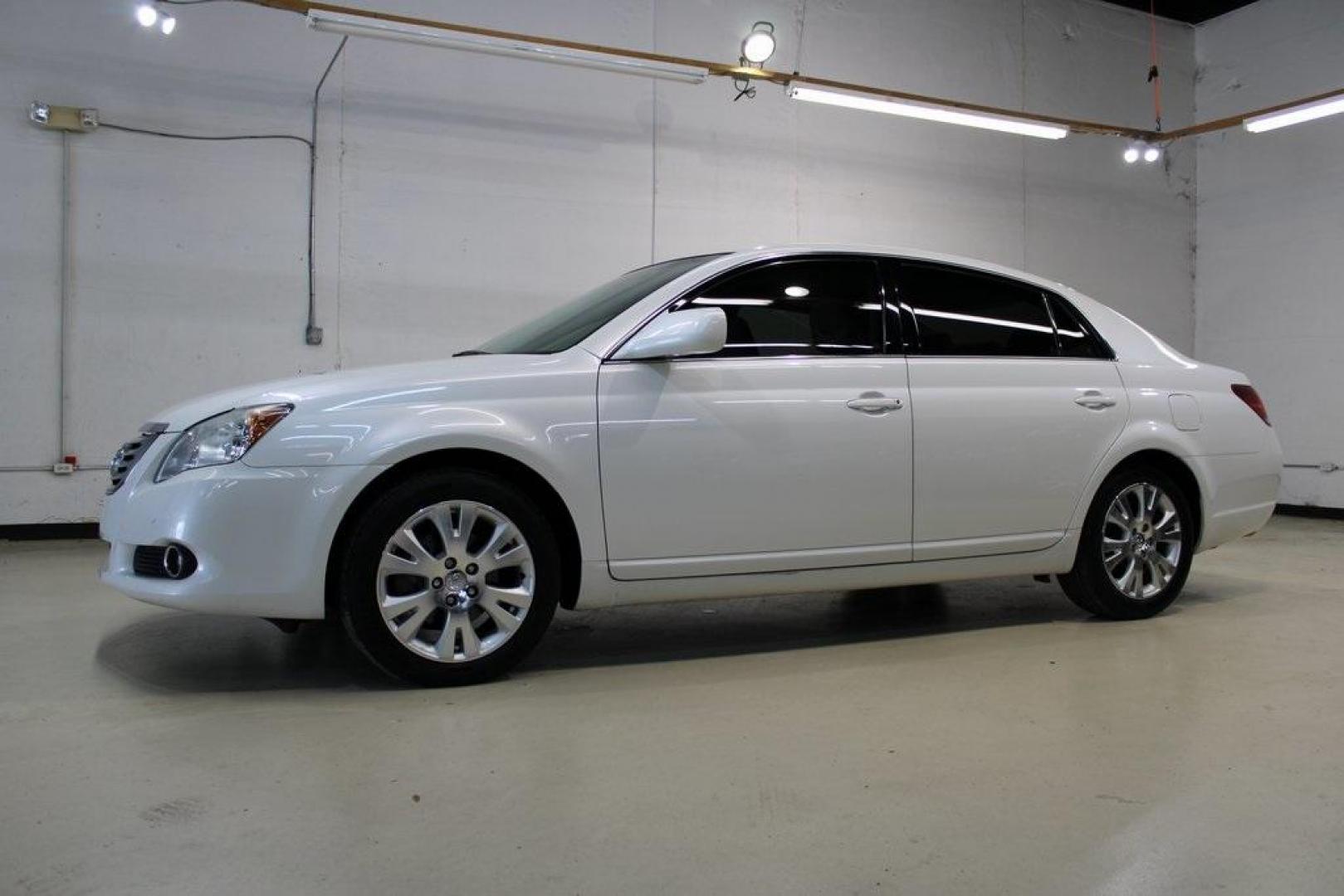 2010 Blizzard Pearl /Ivory Toyota Avalon XLS (4T1BK3DB1AU) with an 3.5L V6 SMPI DOHC engine, Automatic transmission, located at 15300 Midway Rd., Addison, TX, 75001, (972) 702-0011, 32.958321, -96.838074 - HOME OF THE NO HAGGLE PRICE - WHOLESALE PRICES TO THE PUBLIC!! Avalon XLS, 4D Sedan, 3.5L V6 SMPI DOHC, 6-Speed Automatic Electronic with Overdrive, FWD, White, Leather.<br><br>White 2010 Toyota Avalon XLS<br><br>Recent Arrival! 19/28 City/Highway MPG<br><br>Awards:<br> * 2010 KBB.com 10 Most Comfo - Photo#4