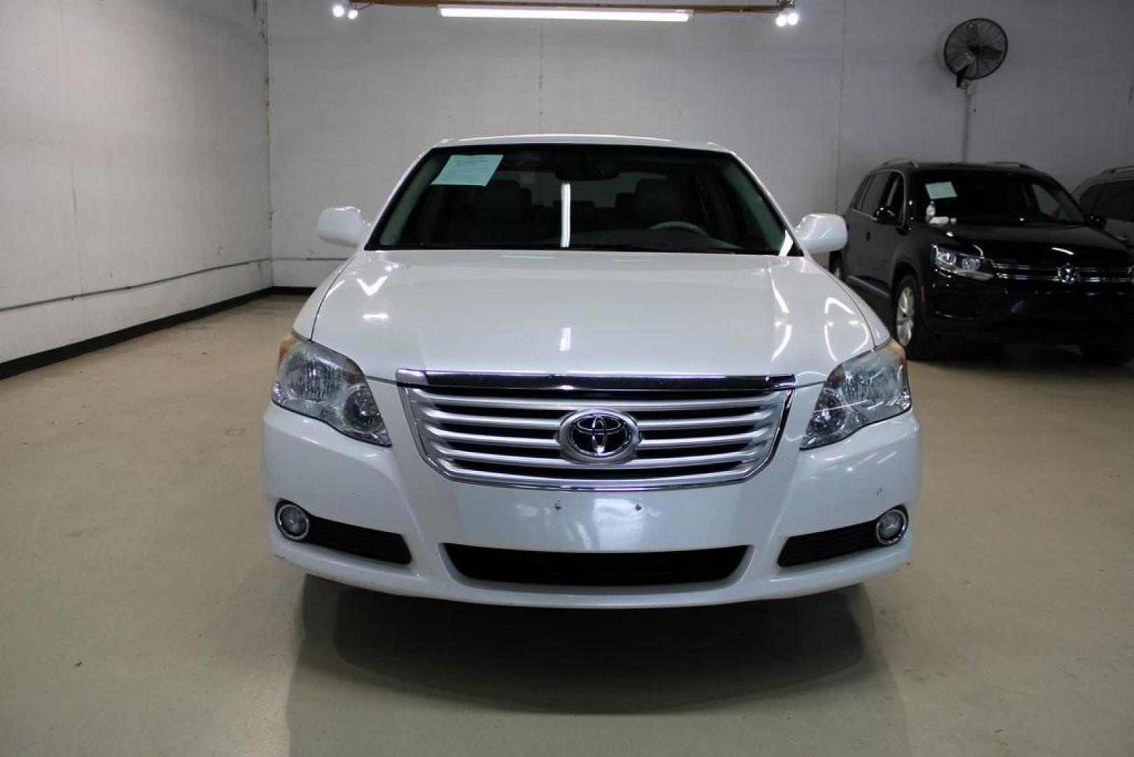 2010 Blizzard Pearl /Ivory Toyota Avalon XLS (4T1BK3DB1AU) with an 3.5L V6 SMPI DOHC engine, Automatic transmission, located at 15300 Midway Rd., Addison, TX, 75001, (972) 702-0011, 32.958321, -96.838074 - HOME OF THE NO HAGGLE PRICE - WHOLESALE PRICES TO THE PUBLIC!! Avalon XLS, 4D Sedan, 3.5L V6 SMPI DOHC, 6-Speed Automatic Electronic with Overdrive, FWD, White, Leather.<br><br>White 2010 Toyota Avalon XLS<br><br>Recent Arrival! 19/28 City/Highway MPG<br><br>Awards:<br> * 2010 KBB.com 10 Most Comfo - Photo#5