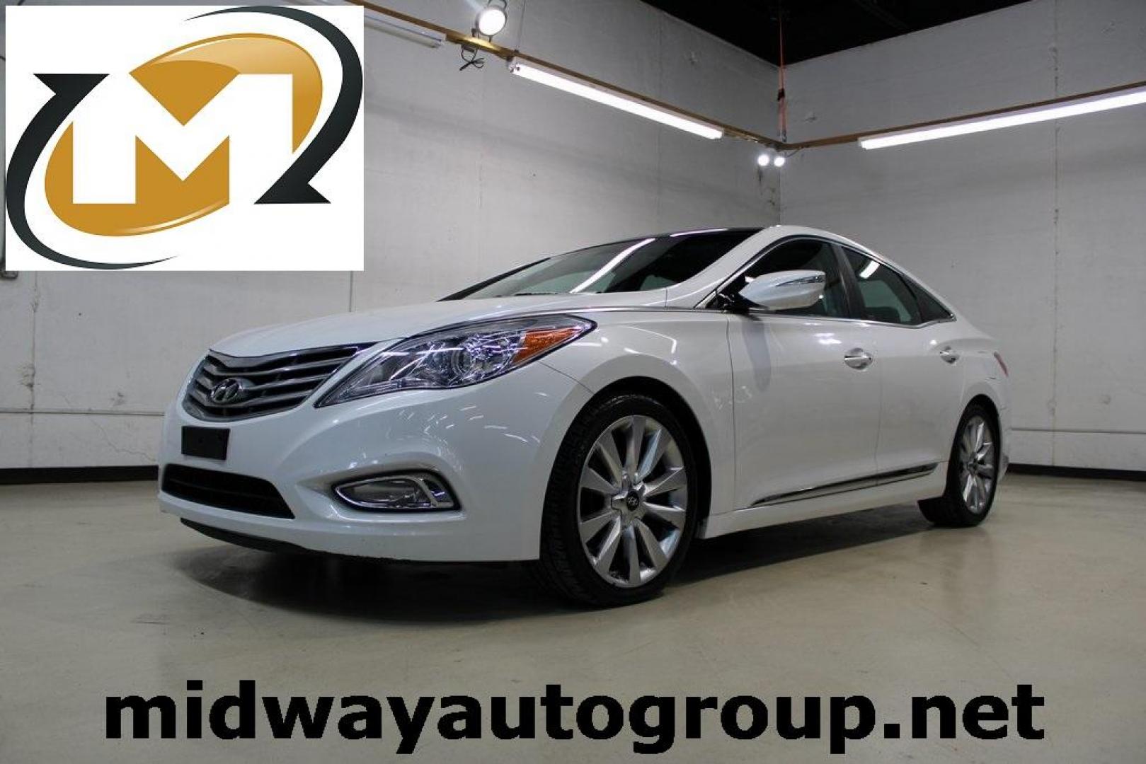 2013 Porcelain White Pearl /Graphite Hyundai Azera Base (KMHFH4JG1DA) with an 3.3L V6 DGI DOHC Variable Intake System engine, Automatic transmission, located at 15300 Midway Rd., Addison, TX, 75001, (972) 702-0011, 32.958321, -96.838074 - HOME OF THE NO HAGGLE PRICE - WHOLESALE PRICES TO THE PUBLIC!! 4D Sedan, 3.3L V6 DGI DOHC Variable Intake System, 6-Speed Automatic with Shiftronic, FWD, Porcelain White Pearl, Graphite Leather.<br><br>Porcelain White Pearl 2013 Hyundai Azera<br><br>Recent Arrival! 20/29 City/Highway MPG<br><br>Awar - Photo#0