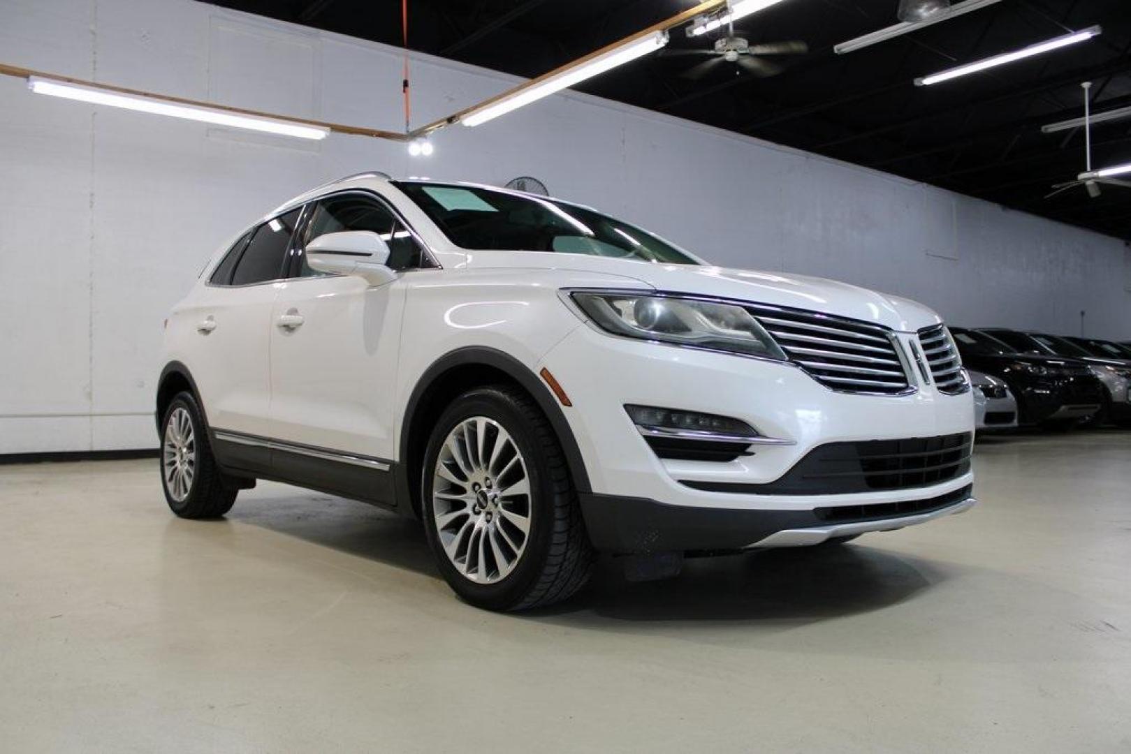 2017 White Platinum Metallic Tri-Coat /Jet Black Lincoln MKC Reserve (5LMCJ3C9XHU) with an 2.0L GTDi engine, Automatic transmission, located at 15300 Midway Rd., Addison, TX, 75001, (972) 702-0011, 32.958321, -96.838074 - HOME OF THE NO HAGGLE PRICE - WHOLESALE PRICES TO THE PUBLIC!! Bluetooth, Hands Free Connectivity, Navigation, Backup Camera, Leather Seats, Sunroof / Moonroof, Power Liftgate, MKC Reserve, 4D Sport Utility, 2.0L GTDi, 6-Speed Automatic, FWD, White, Jet Black Leather.<br><br>White 2017 Lincoln MKC R - Photo#1