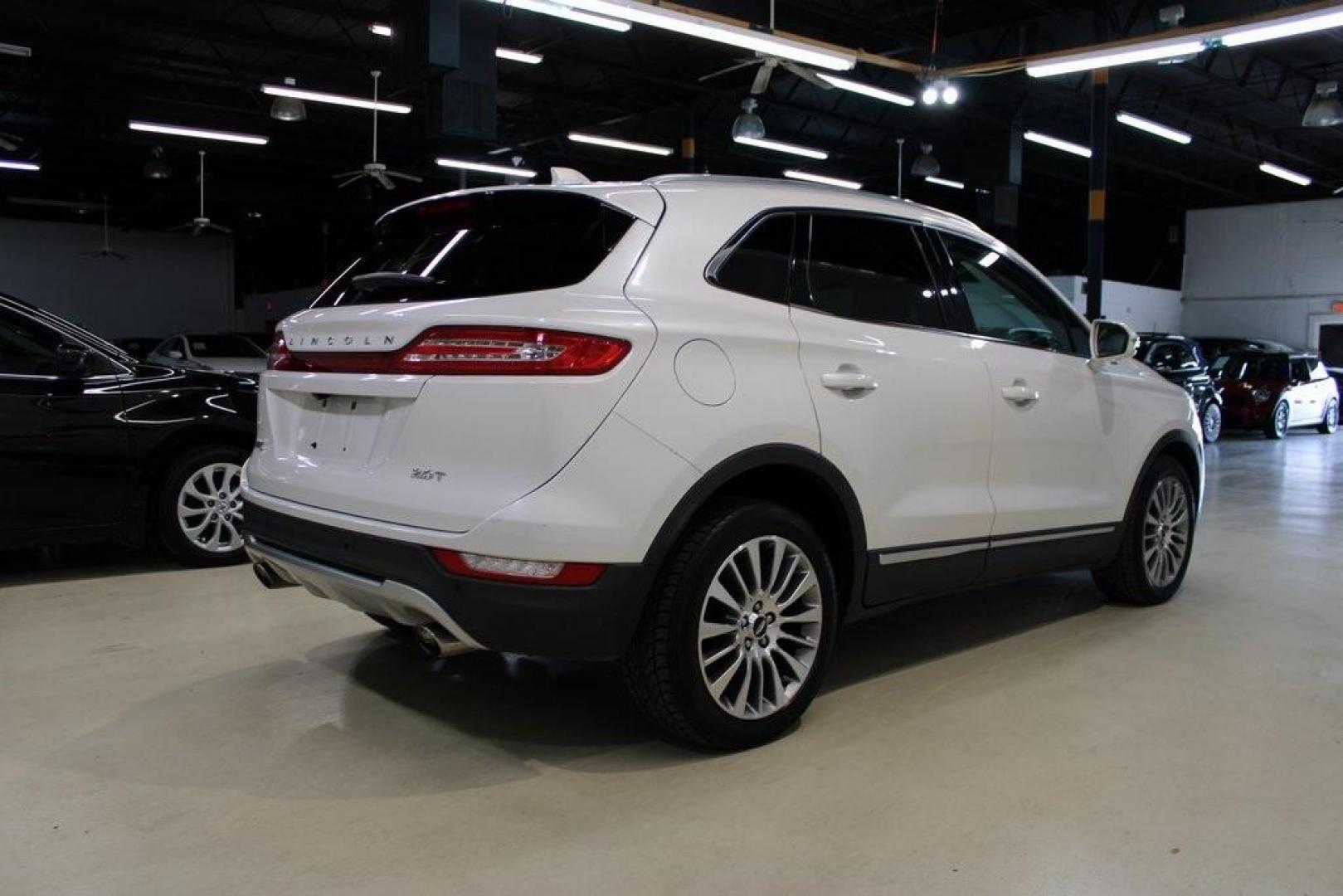 2017 White Platinum Metallic Tri-Coat /Jet Black Lincoln MKC Reserve (5LMCJ3C9XHU) with an 2.0L GTDi engine, Automatic transmission, located at 15300 Midway Rd., Addison, TX, 75001, (972) 702-0011, 32.958321, -96.838074 - HOME OF THE NO HAGGLE PRICE - WHOLESALE PRICES TO THE PUBLIC!! Bluetooth, Hands Free Connectivity, Navigation, Backup Camera, Leather Seats, Sunroof / Moonroof, Power Liftgate, MKC Reserve, 4D Sport Utility, 2.0L GTDi, 6-Speed Automatic, FWD, White, Jet Black Leather.<br><br>White 2017 Lincoln MKC R - Photo#2