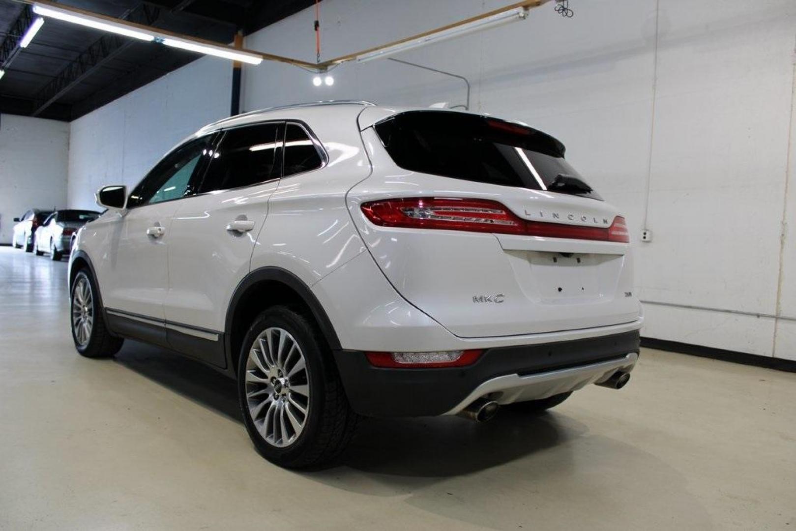 2017 White Platinum Metallic Tri-Coat /Jet Black Lincoln MKC Reserve (5LMCJ3C9XHU) with an 2.0L GTDi engine, Automatic transmission, located at 15300 Midway Rd., Addison, TX, 75001, (972) 702-0011, 32.958321, -96.838074 - HOME OF THE NO HAGGLE PRICE - WHOLESALE PRICES TO THE PUBLIC!! Bluetooth, Hands Free Connectivity, Navigation, Backup Camera, Leather Seats, Sunroof / Moonroof, Power Liftgate, MKC Reserve, 4D Sport Utility, 2.0L GTDi, 6-Speed Automatic, FWD, White, Jet Black Leather.<br><br>White 2017 Lincoln MKC R - Photo#3