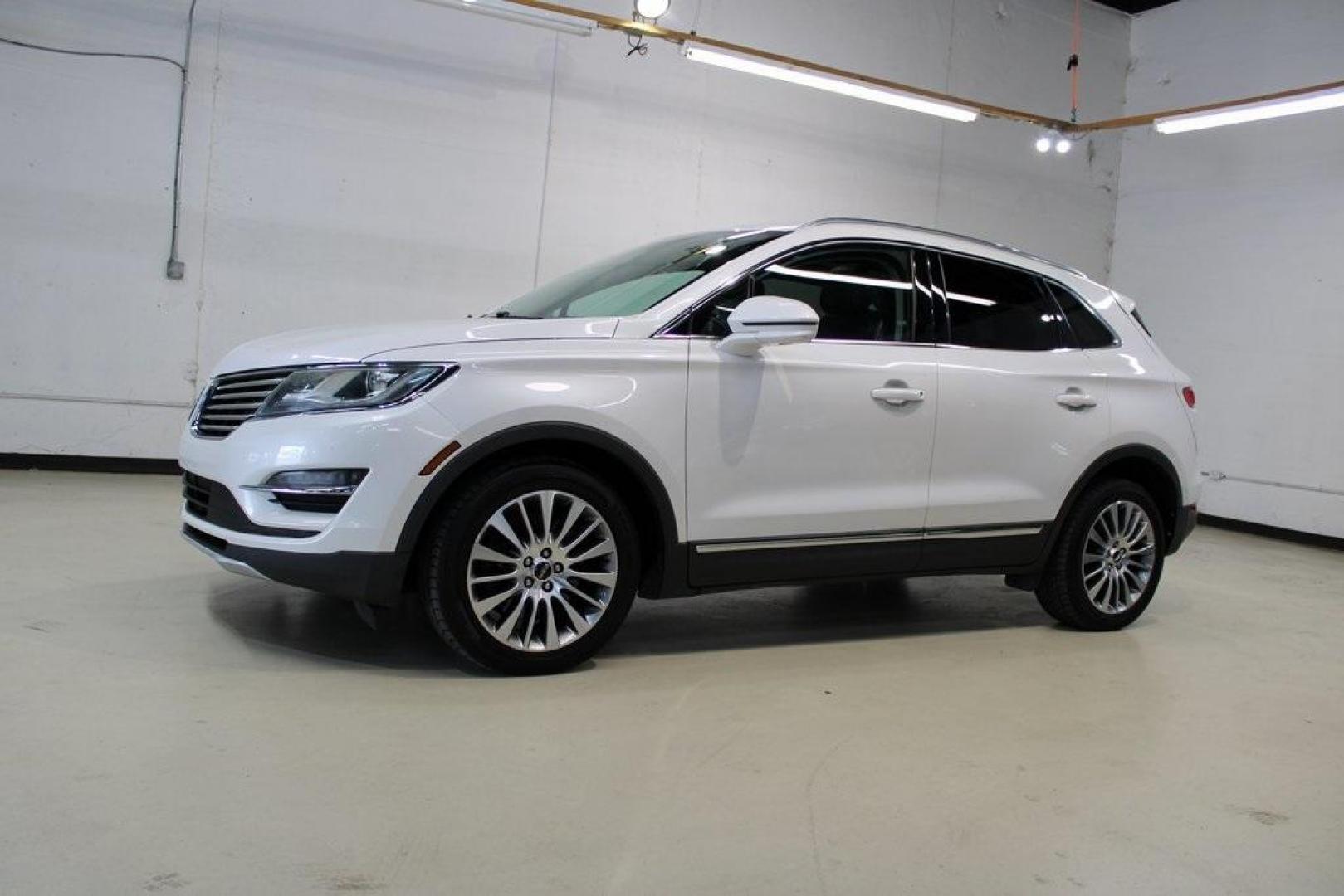 2017 White Platinum Metallic Tri-Coat /Jet Black Lincoln MKC Reserve (5LMCJ3C9XHU) with an 2.0L GTDi engine, Automatic transmission, located at 15300 Midway Rd., Addison, TX, 75001, (972) 702-0011, 32.958321, -96.838074 - HOME OF THE NO HAGGLE PRICE - WHOLESALE PRICES TO THE PUBLIC!! Bluetooth, Hands Free Connectivity, Navigation, Backup Camera, Leather Seats, Sunroof / Moonroof, Power Liftgate, MKC Reserve, 4D Sport Utility, 2.0L GTDi, 6-Speed Automatic, FWD, White, Jet Black Leather.<br><br>White 2017 Lincoln MKC R - Photo#4