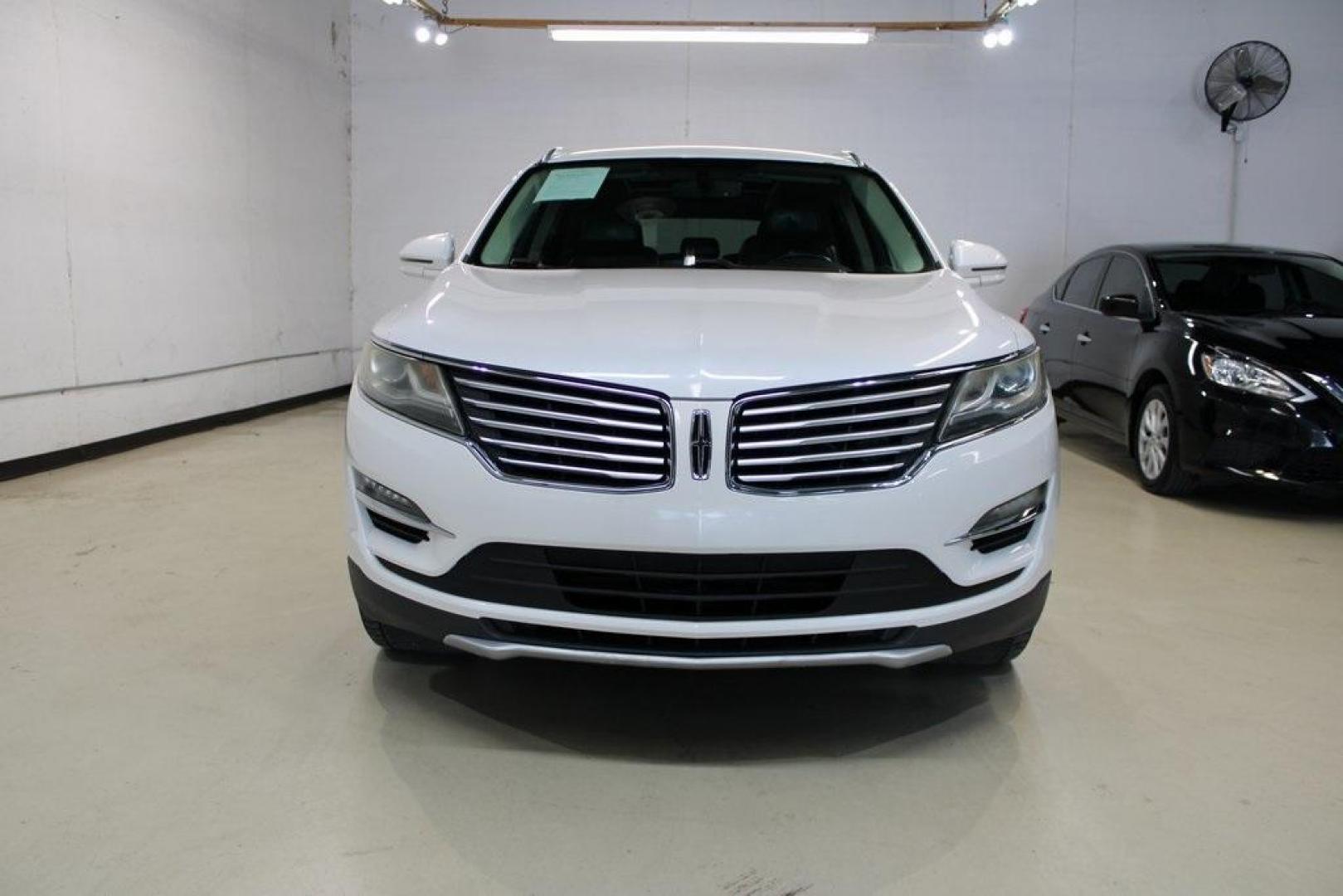 2017 White Platinum Metallic Tri-Coat /Jet Black Lincoln MKC Reserve (5LMCJ3C9XHU) with an 2.0L GTDi engine, Automatic transmission, located at 15300 Midway Rd., Addison, TX, 75001, (972) 702-0011, 32.958321, -96.838074 - HOME OF THE NO HAGGLE PRICE - WHOLESALE PRICES TO THE PUBLIC!! Bluetooth, Hands Free Connectivity, Navigation, Backup Camera, Leather Seats, Sunroof / Moonroof, Power Liftgate, MKC Reserve, 4D Sport Utility, 2.0L GTDi, 6-Speed Automatic, FWD, White, Jet Black Leather.<br><br>White 2017 Lincoln MKC R - Photo#5