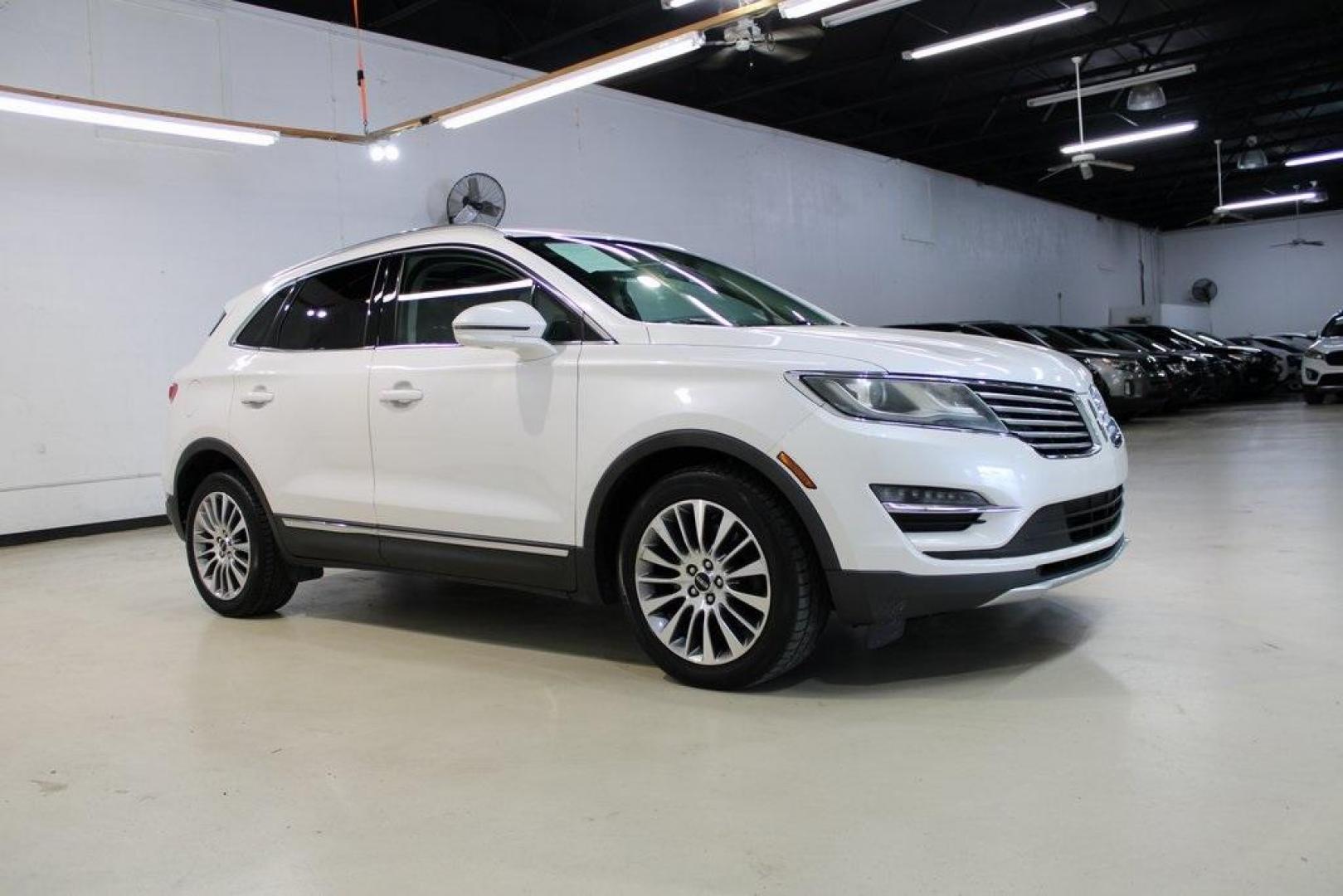 2017 White Platinum Metallic Tri-Coat /Jet Black Lincoln MKC Reserve (5LMCJ3C9XHU) with an 2.0L GTDi engine, Automatic transmission, located at 15300 Midway Rd., Addison, TX, 75001, (972) 702-0011, 32.958321, -96.838074 - HOME OF THE NO HAGGLE PRICE - WHOLESALE PRICES TO THE PUBLIC!! Bluetooth, Hands Free Connectivity, Navigation, Backup Camera, Leather Seats, Sunroof / Moonroof, Power Liftgate, MKC Reserve, 4D Sport Utility, 2.0L GTDi, 6-Speed Automatic, FWD, White, Jet Black Leather.<br><br>White 2017 Lincoln MKC R - Photo#6