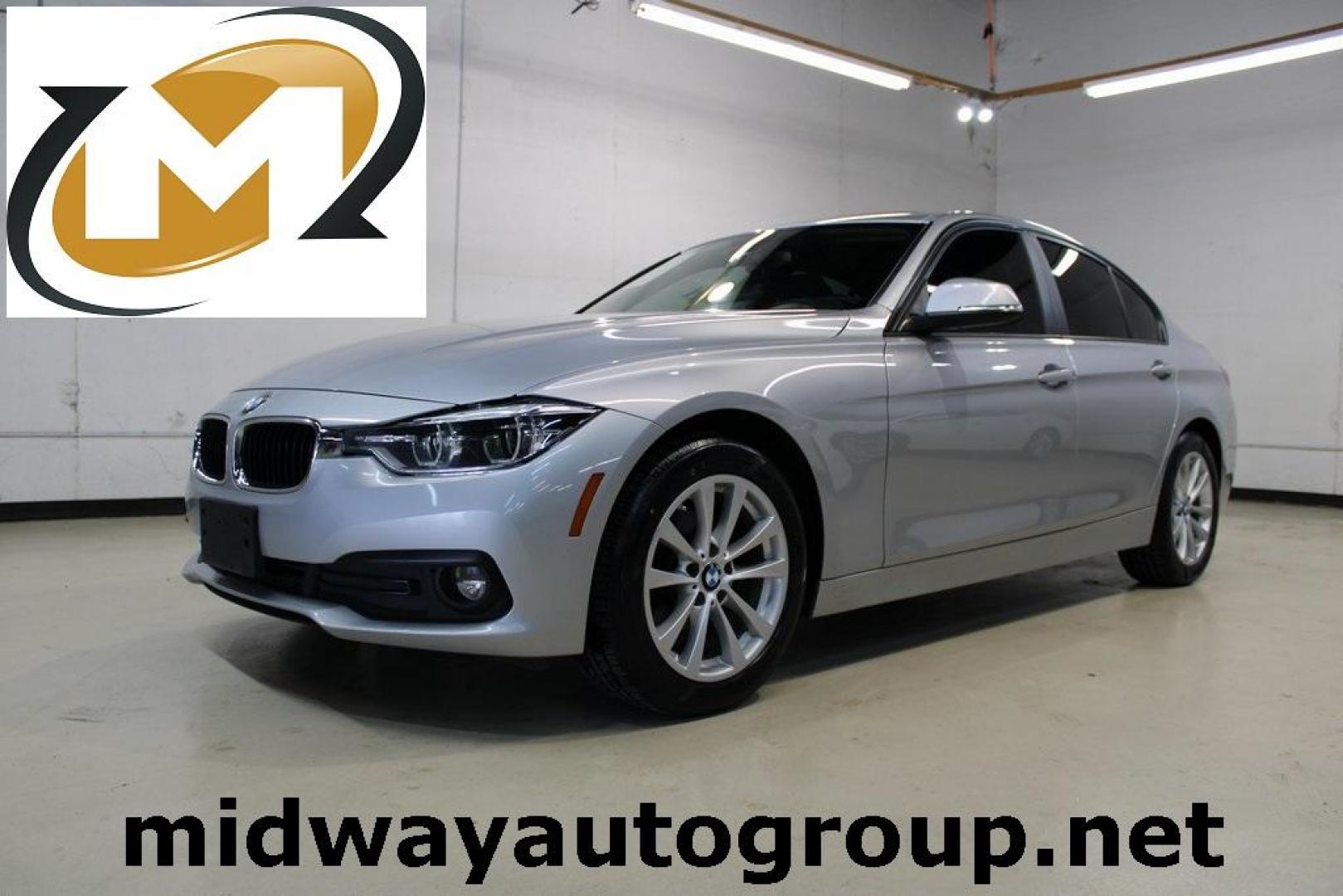 2018 Glacier Silver Metallic /Black BMW 3 Series 320i (WBA8E1G52JN) with an 2.0L 4-Cylinder DOHC 16V TwinPower Turbo engine, Automatic transmission, located at 15300 Midway Rd., Addison, TX, 75001, (972) 702-0011, 32.958321, -96.838074 - HOME OF THE NO HAGGLE PRICE - WHOLESALE PRICES TO THE PUBLIC!! 320i, 4D Sedan, 2.0L 4-Cylinder DOHC 16V TwinPower Turbo, 8-Speed Automatic, RWD, Glacier Silver Metallic, Black Artificial Leather.<br><br>Glacier Silver Metallic 2018 BMW 3 Series 320i<br><br>Recent Arrival! 24/35 City/Highway MPG<br>< - Photo#0