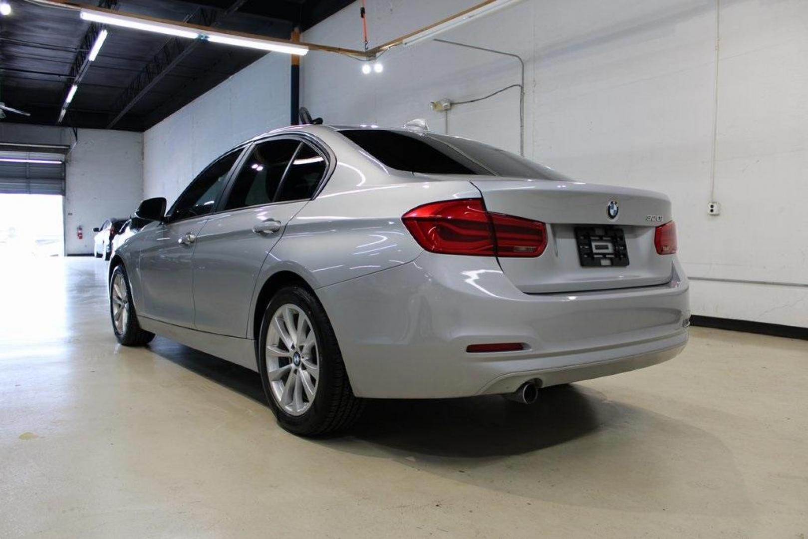 2018 Glacier Silver Metallic /Black BMW 3 Series 320i (WBA8E1G52JN) with an 2.0L 4-Cylinder DOHC 16V TwinPower Turbo engine, Automatic transmission, located at 15300 Midway Rd., Addison, TX, 75001, (972) 702-0011, 32.958321, -96.838074 - HOME OF THE NO HAGGLE PRICE - WHOLESALE PRICES TO THE PUBLIC!! 320i, 4D Sedan, 2.0L 4-Cylinder DOHC 16V TwinPower Turbo, 8-Speed Automatic, RWD, Glacier Silver Metallic, Black Artificial Leather.<br><br>Glacier Silver Metallic 2018 BMW 3 Series 320i<br><br>Recent Arrival! 24/35 City/Highway MPG<br>< - Photo#4