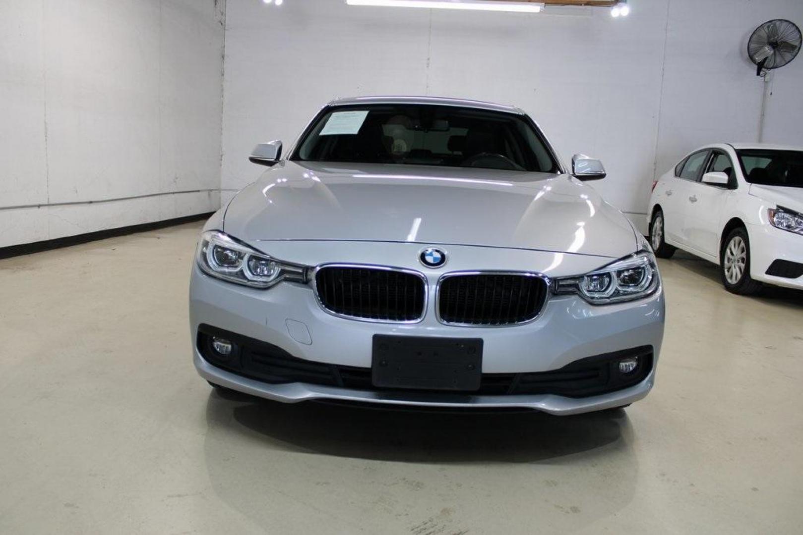 2018 Glacier Silver Metallic /Black BMW 3 Series 320i (WBA8E1G52JN) with an 2.0L 4-Cylinder DOHC 16V TwinPower Turbo engine, Automatic transmission, located at 15300 Midway Rd., Addison, TX, 75001, (972) 702-0011, 32.958321, -96.838074 - HOME OF THE NO HAGGLE PRICE - WHOLESALE PRICES TO THE PUBLIC!! 320i, 4D Sedan, 2.0L 4-Cylinder DOHC 16V TwinPower Turbo, 8-Speed Automatic, RWD, Glacier Silver Metallic, Black Artificial Leather.<br><br>Glacier Silver Metallic 2018 BMW 3 Series 320i<br><br>Recent Arrival! 24/35 City/Highway MPG<br>< - Photo#6