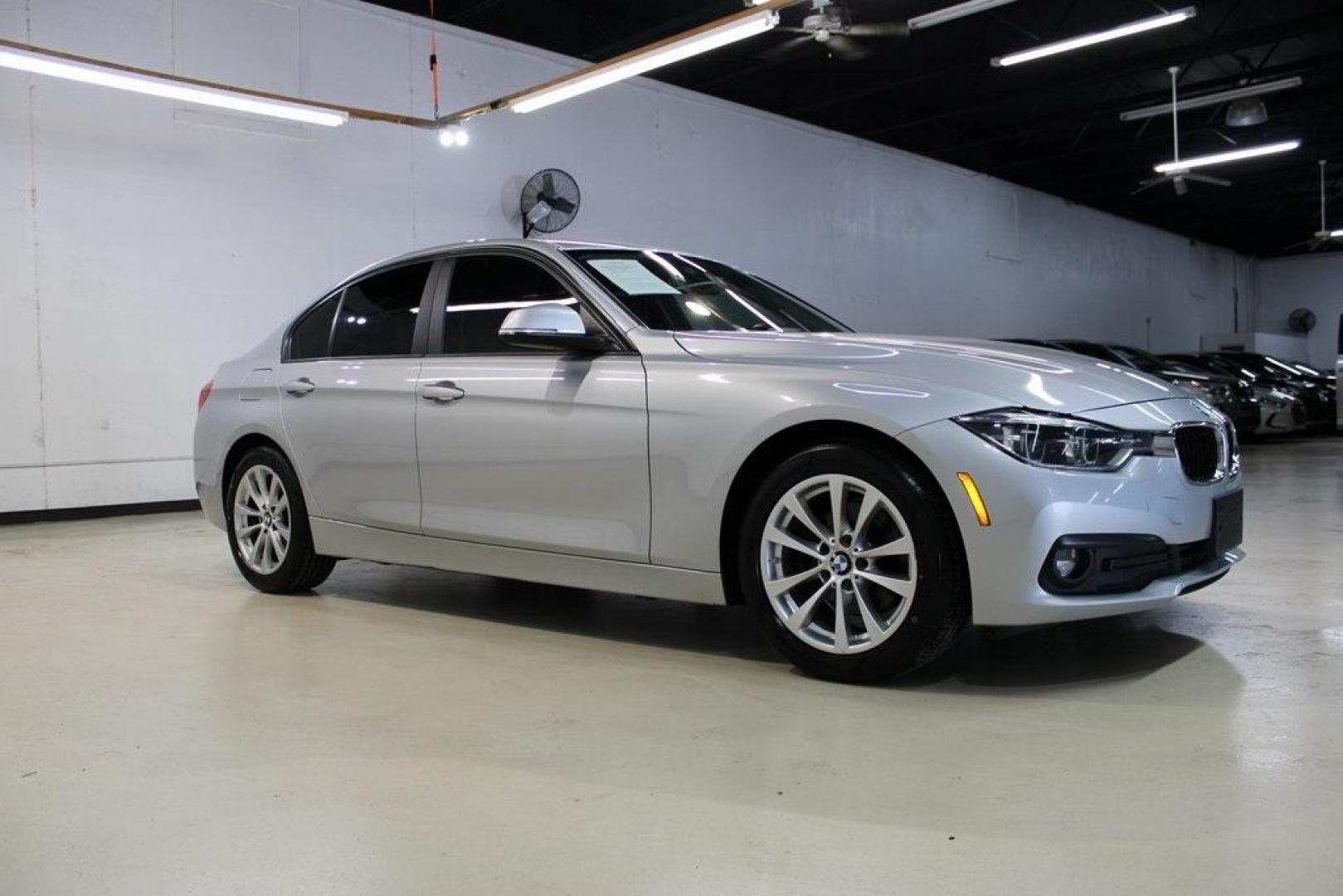 2018 Glacier Silver Metallic /Black BMW 3 Series 320i (WBA8E1G52JN) with an 2.0L 4-Cylinder DOHC 16V TwinPower Turbo engine, Automatic transmission, located at 15300 Midway Rd., Addison, TX, 75001, (972) 702-0011, 32.958321, -96.838074 - HOME OF THE NO HAGGLE PRICE - WHOLESALE PRICES TO THE PUBLIC!! 320i, 4D Sedan, 2.0L 4-Cylinder DOHC 16V TwinPower Turbo, 8-Speed Automatic, RWD, Glacier Silver Metallic, Black Artificial Leather.<br><br>Glacier Silver Metallic 2018 BMW 3 Series 320i<br><br>Recent Arrival! 24/35 City/Highway MPG<br>< - Photo#7