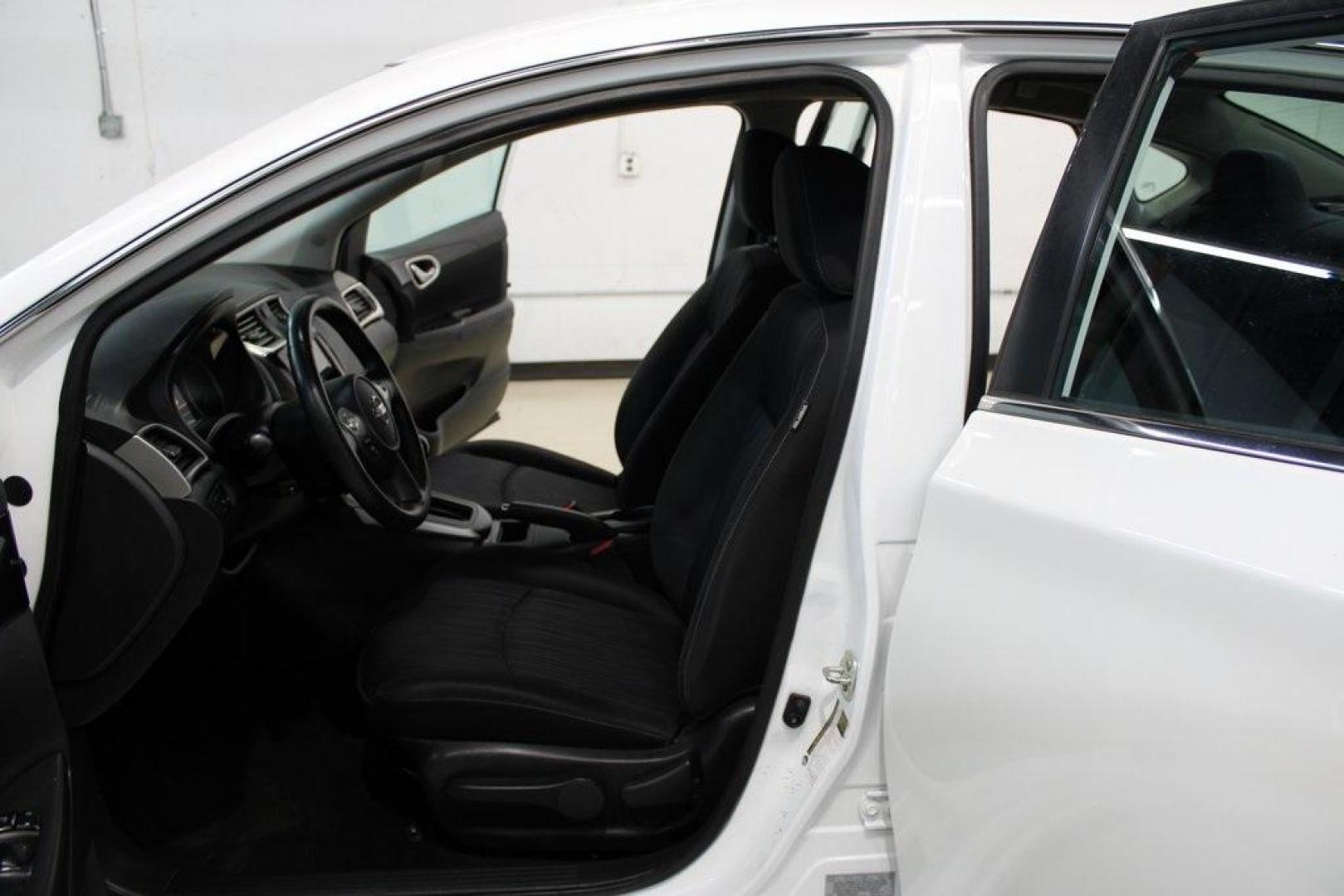 2019 Aspen White Tricoat /Charcoal Nissan Sentra SV (3N1AB7AP7KY) with an 1.8L 4-Cylinder DOHC 16V engine, CVT transmission, located at 15300 Midway Rd., Addison, TX, 75001, (972) 702-0011, 32.958321, -96.838074 - HOME OF THE NO HAGGLE PRICE - WHOLESALE PRICES TO THE PUBLIC!! Sentra SV, 4D Sedan, 1.8L 4-Cylinder DOHC 16V, CVT with Xtronic, FWD, Aspen White Tricoat, Charcoal Cloth.<br><br>Aspen White Tricoat 2019 Nissan Sentra SV<br><br>Recent Arrival! 29/37 City/Highway MPG<br><br><br>At Midway Auto Group, we - Photo#13