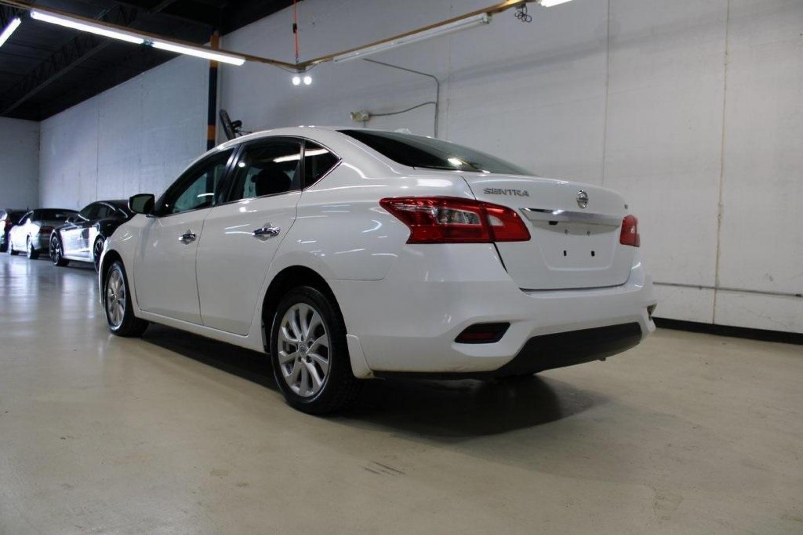 2019 Aspen White Tricoat /Charcoal Nissan Sentra SV (3N1AB7AP7KY) with an 1.8L 4-Cylinder DOHC 16V engine, CVT transmission, located at 15300 Midway Rd., Addison, TX, 75001, (972) 702-0011, 32.958321, -96.838074 - HOME OF THE NO HAGGLE PRICE - WHOLESALE PRICES TO THE PUBLIC!! Sentra SV, 4D Sedan, 1.8L 4-Cylinder DOHC 16V, CVT with Xtronic, FWD, Aspen White Tricoat, Charcoal Cloth.<br><br>Aspen White Tricoat 2019 Nissan Sentra SV<br><br>Recent Arrival! 29/37 City/Highway MPG<br><br><br>At Midway Auto Group, we - Photo#3