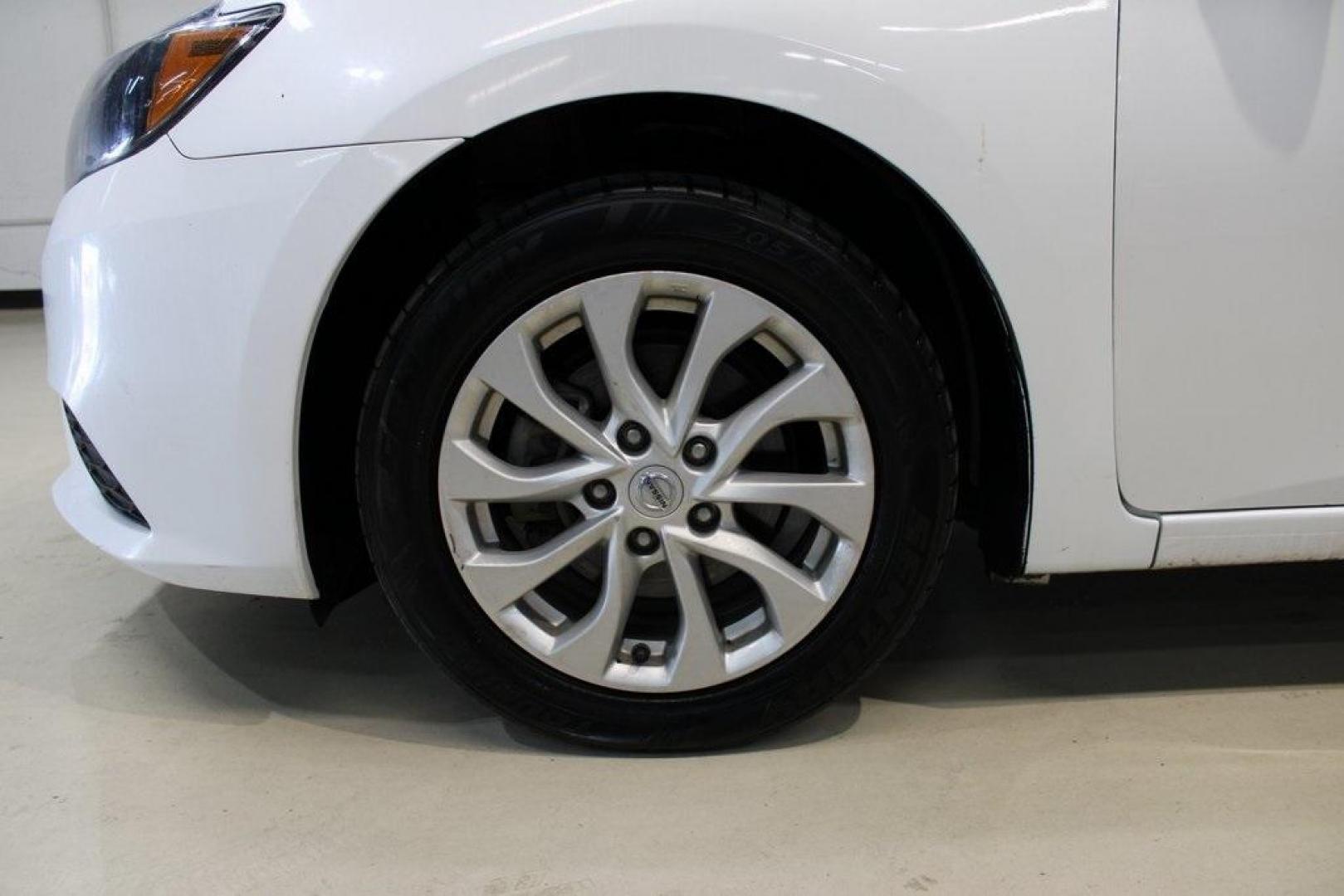 2019 Aspen White Tricoat /Charcoal Nissan Sentra SV (3N1AB7AP7KY) with an 1.8L 4-Cylinder DOHC 16V engine, CVT transmission, located at 15300 Midway Rd., Addison, TX, 75001, (972) 702-0011, 32.958321, -96.838074 - HOME OF THE NO HAGGLE PRICE - WHOLESALE PRICES TO THE PUBLIC!! Sentra SV, 4D Sedan, 1.8L 4-Cylinder DOHC 16V, CVT with Xtronic, FWD, Aspen White Tricoat, Charcoal Cloth.<br><br>Aspen White Tricoat 2019 Nissan Sentra SV<br><br>Recent Arrival! 29/37 City/Highway MPG<br><br><br>At Midway Auto Group, we - Photo#8