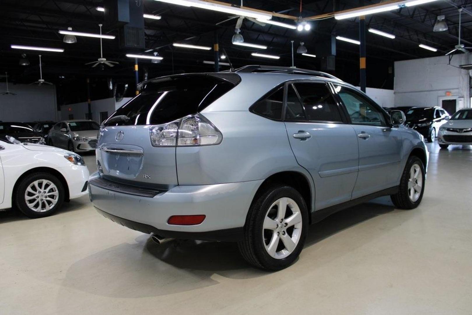 2007 Millennium Silver Metallic /Ivory Lexus RX 350 (JTJGK31U170) with an 3.5L V6 DOHC Dual VVT-i 24V engine, Automatic transmission, located at 15300 Midway Rd., Addison, TX, 75001, (972) 702-0011, 32.958321, -96.838074 - HOME OF THE NO HAGGLE PRICE - WHOLESALE PRICES TO THE PUBLIC!! RX 350, 4D Sport Utility, 3.5L V6 DOHC Dual VVT-i 24V, 5-Speed Automatic with Overdrive, FWD, Silver, Cloth. Odometer is 11308 miles below market average!<br><br>Silver 2007 Lexus RX 350<br><br><br>At Midway Auto Group, we strive to prov - Photo#2