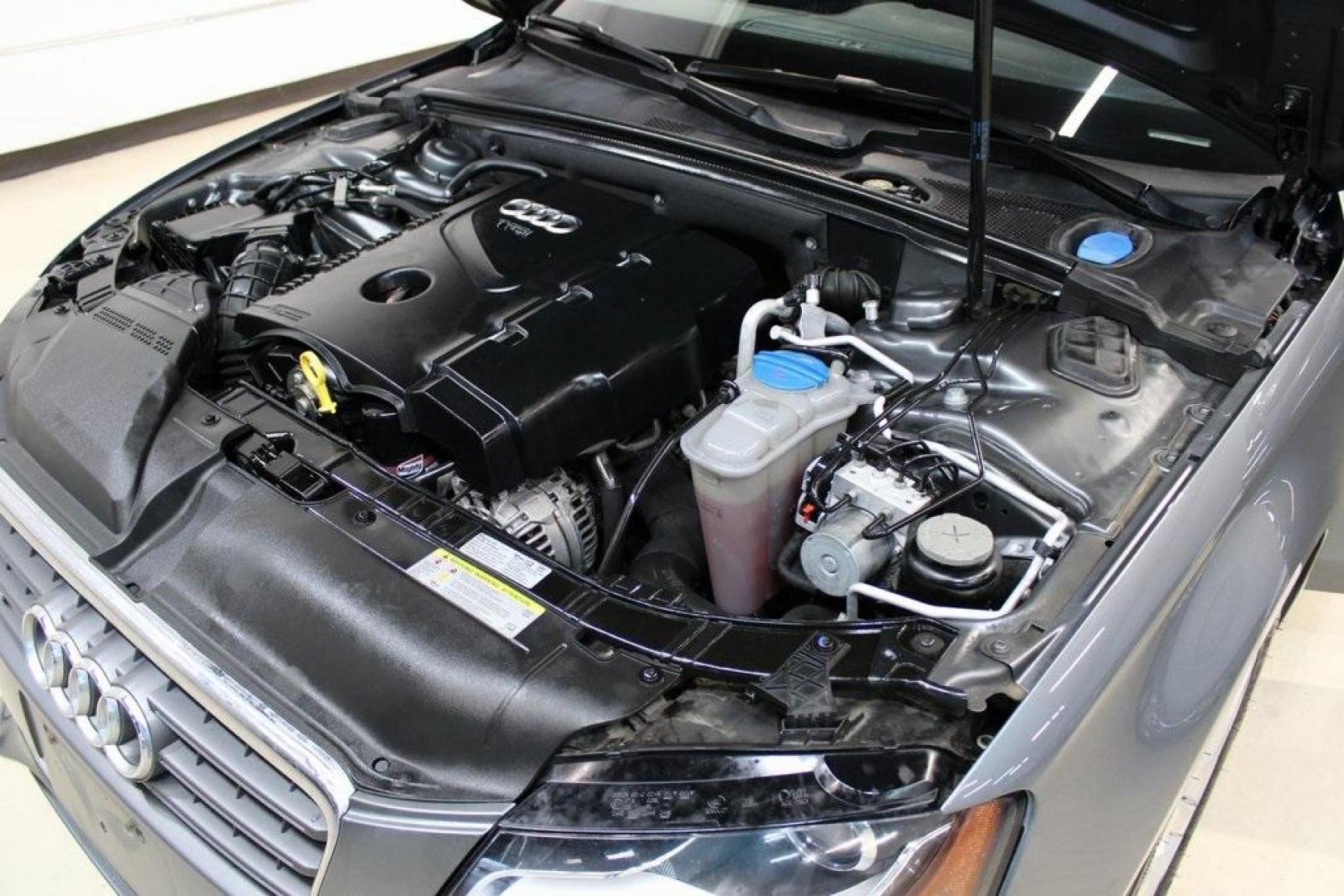 2012 Monsoon Gray Metallic /Black Audi A4 2.0T Premium (WAUBFAFL2CN) with an 2.0L 4-Cylinder TFSI DOHC engine, Automatic transmission, located at 15300 Midway Rd., Addison, TX, 75001, (972) 702-0011, 32.958321, -96.838074 - HOME OF THE NO HAGGLE PRICE - WHOLESALE PRICES TO THE PUBLIC!! A4 2.0T Premium quattro, 4D Sedan, 2.0L 4-Cylinder TFSI DOHC, 8-Speed Automatic with Tiptronic, quattro, Gray, Black Leather.<br><br>Gray 2012 Audi A4 2.0T Premium<br><br>Recent Arrival! 21/29 City/Highway MPG<br><br>Awards:<br> * 2012 - Photo#29